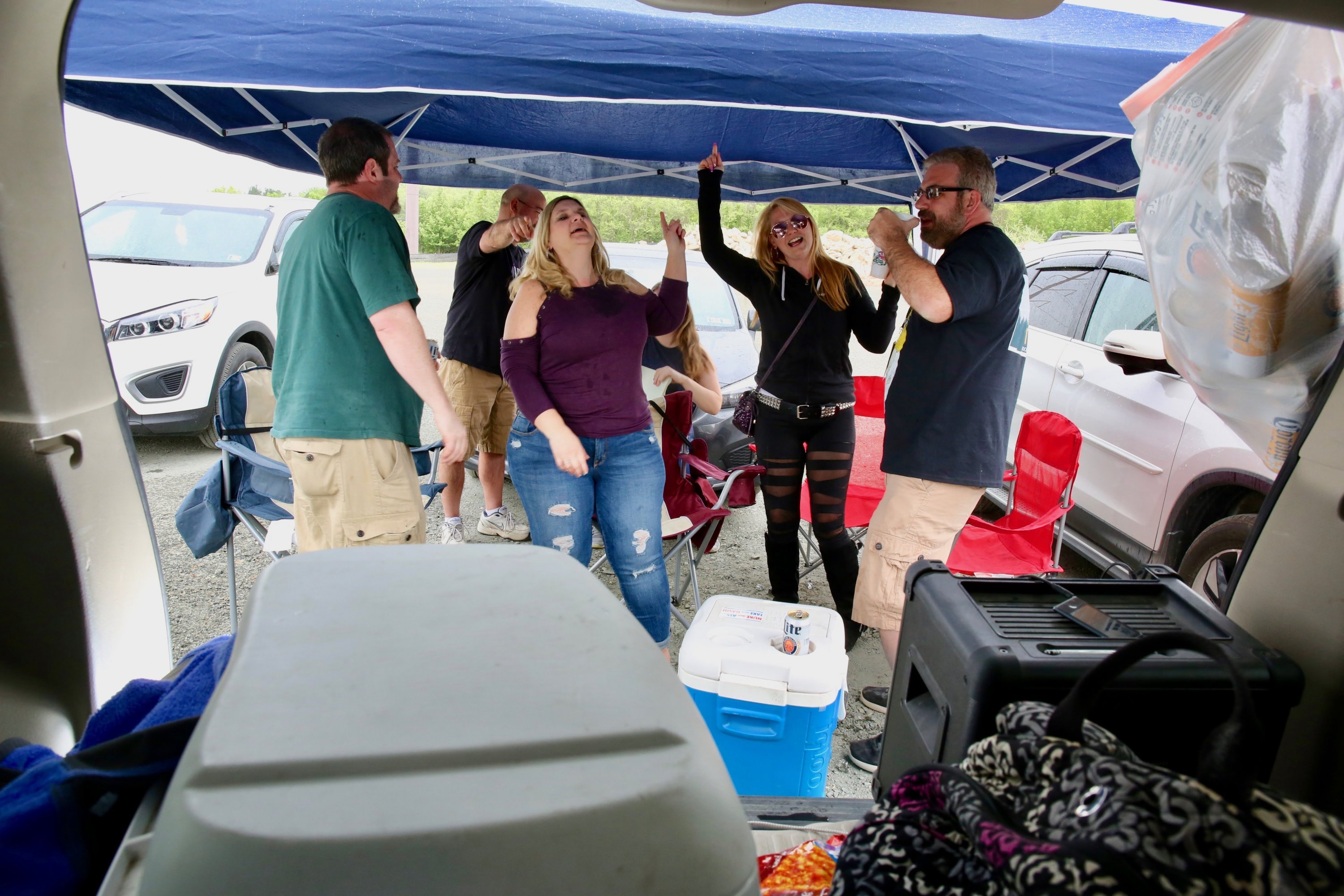 Rick, Michelle, Colleen, and Jeff pump themselves up before the show. 