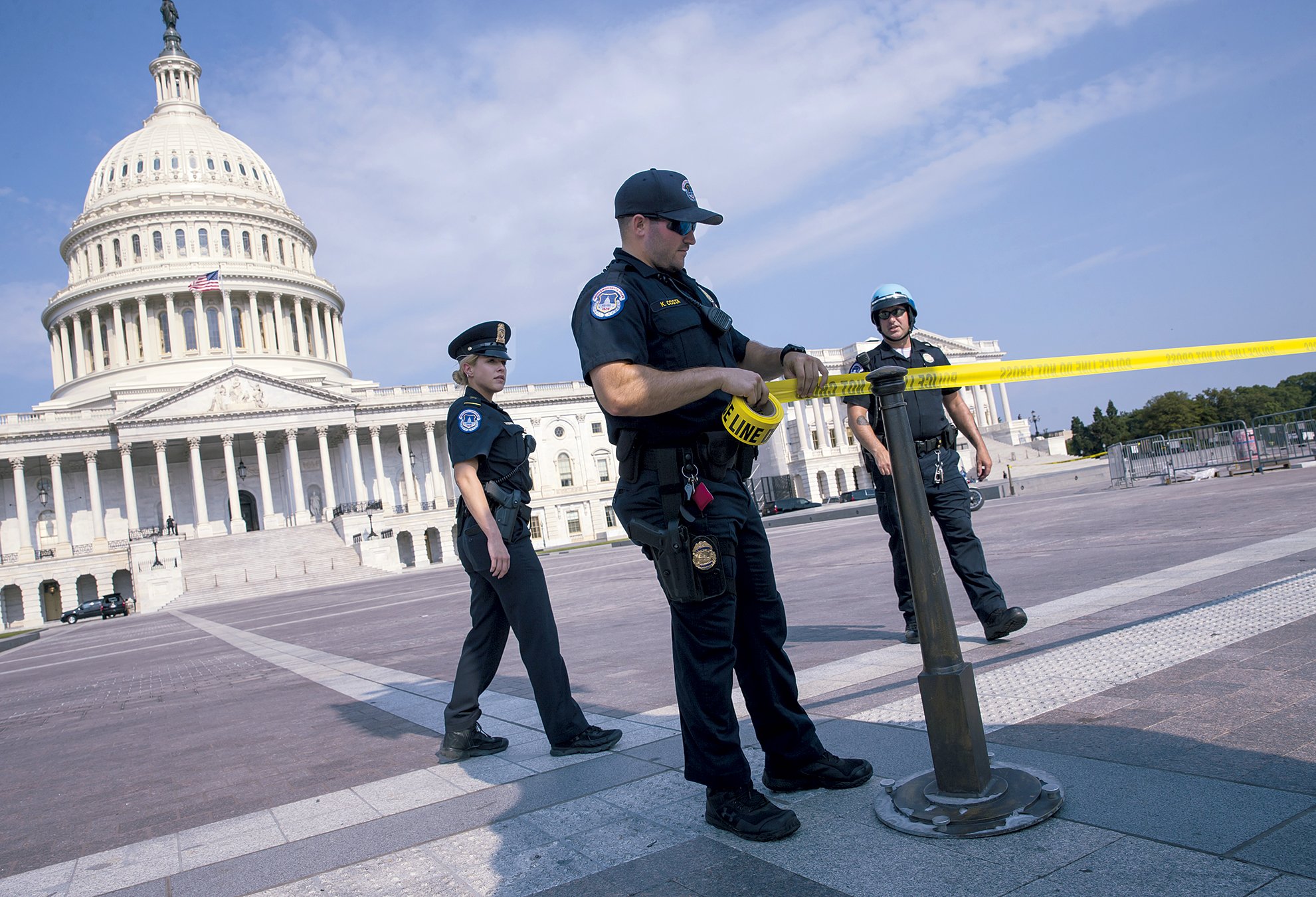 B11 - Washingtonian After the shooting, members returned to the Capitol to get back to work. Photograph of Capitol by Eric Thayer/Bloomberg via Getty Images.
