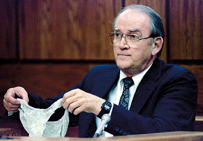 Forensic scientist Myron Scholberg displays the panties Lorena Bobbitt was wearing the night John Wayne Bobbitt allegedly raped her during testimony. Photograph by AFP/Getty Images.