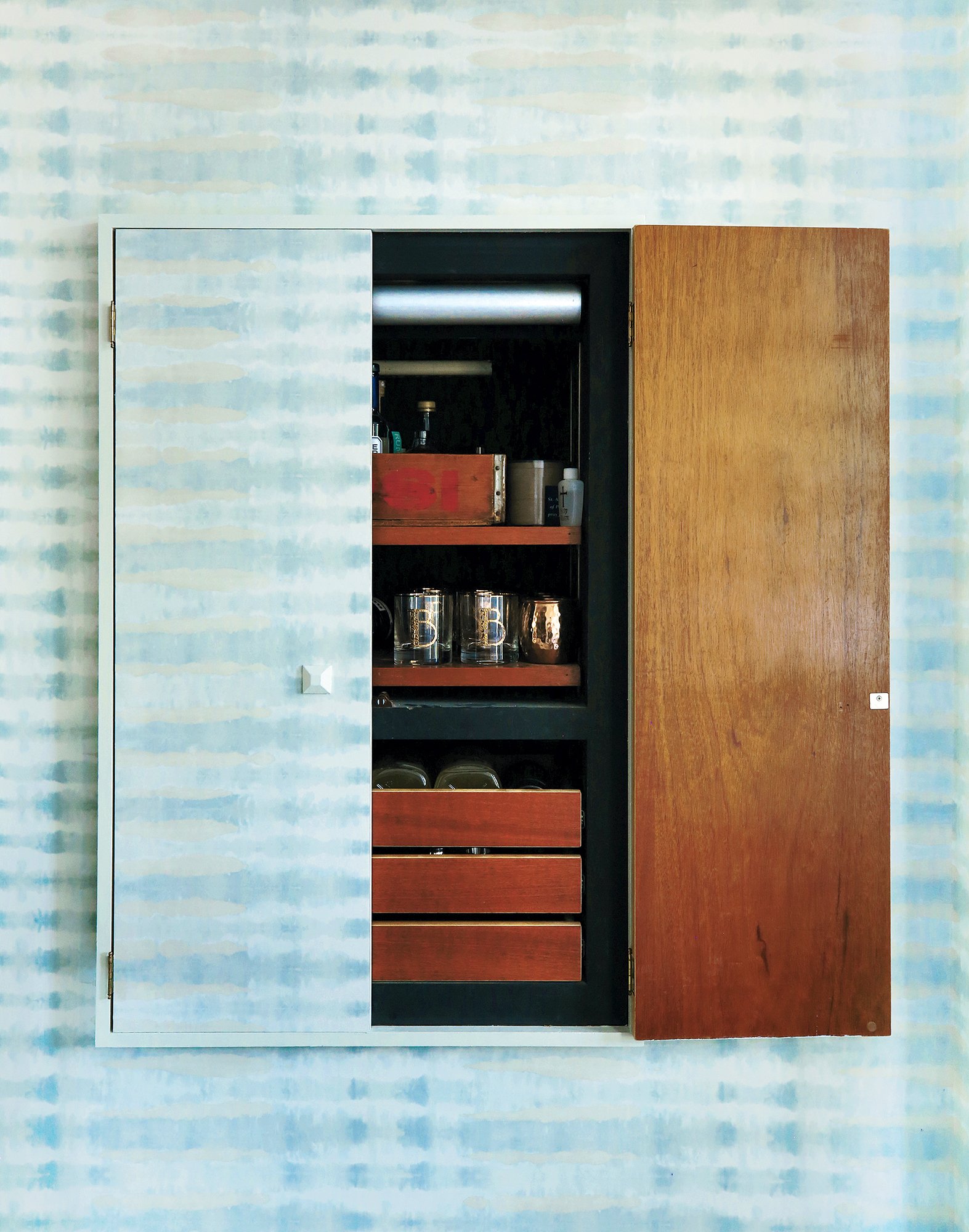 A built-in bar cabinet in a Capitol Hill space. Photograph by Constance Mariena. 