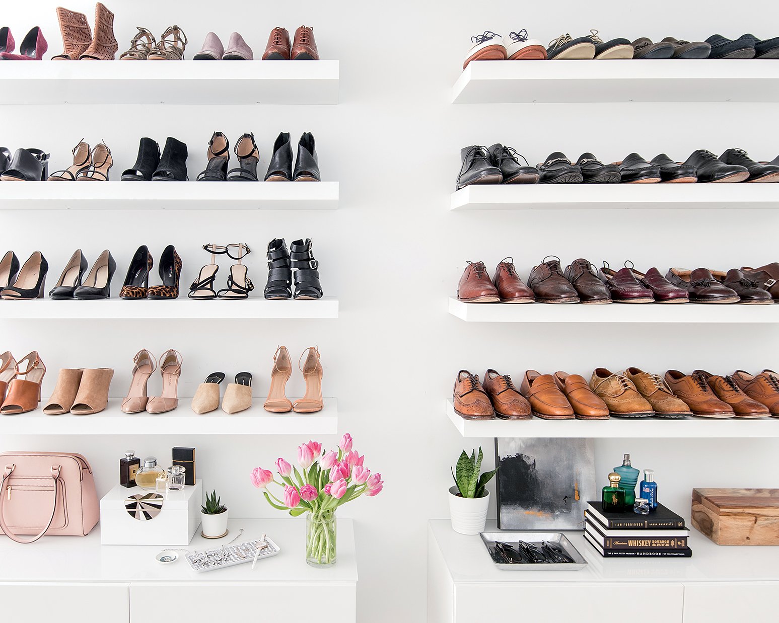 In the entry to the master bedroom, Metzler installed a wall of Ikea shelving to hold shoes.