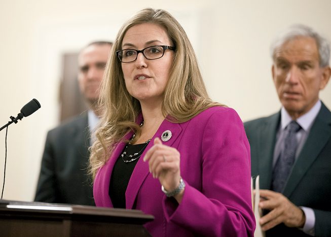 This year, when she faces Democrat Jennifer Wexton, those ties—and Trump—will again be front and center. Photograph by Steve Helber/AP Photo.