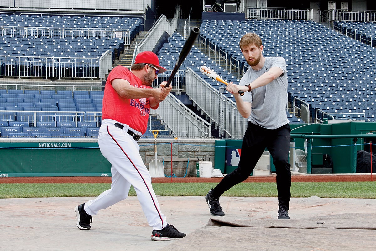 Nats hitting coach Kevin Long gives a novice some tips. Photograph by Evy Mages.