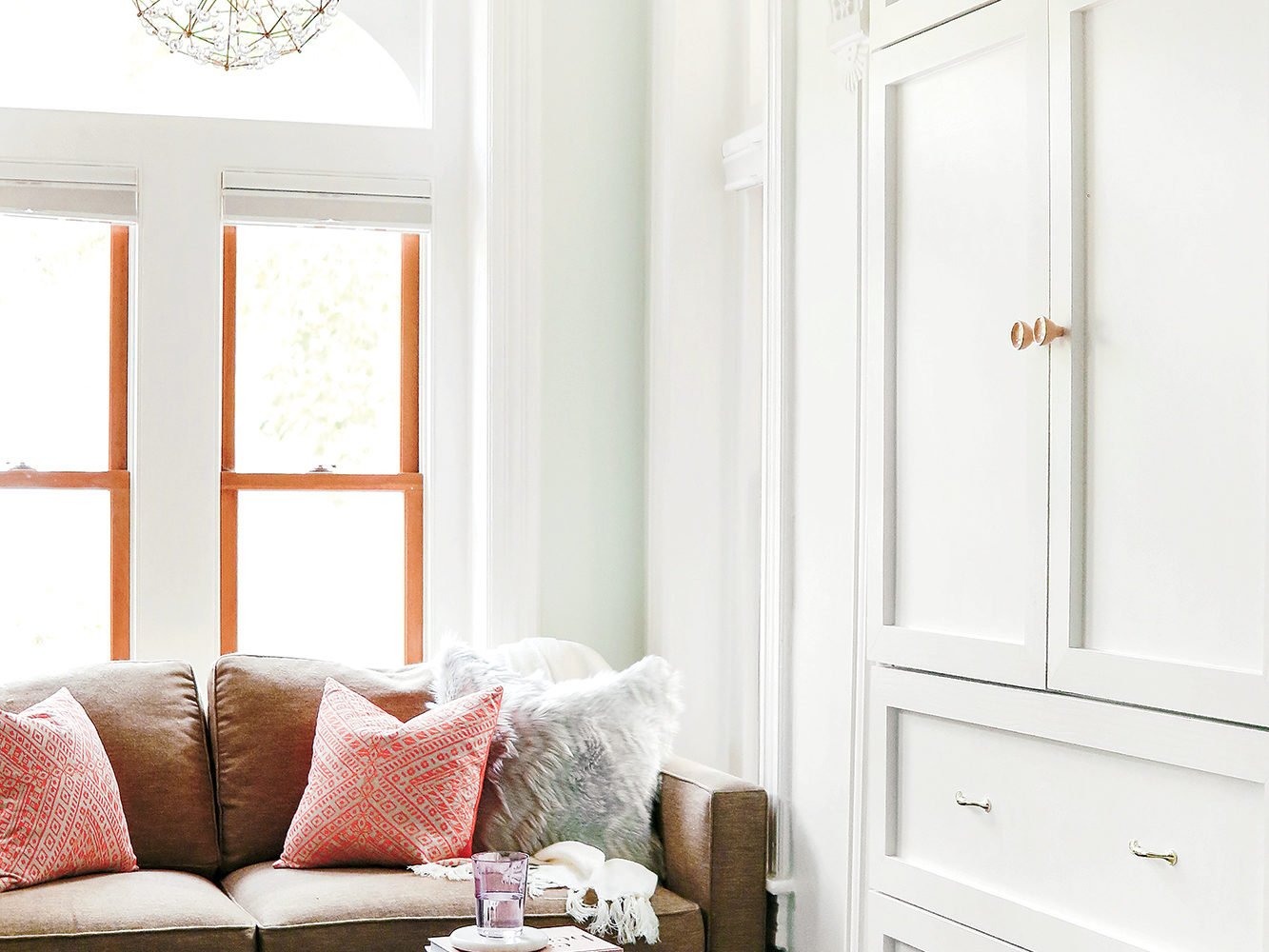 Mary Jo Major did away with the clutter that littered the old space by adding built-in storage to the window alcove.