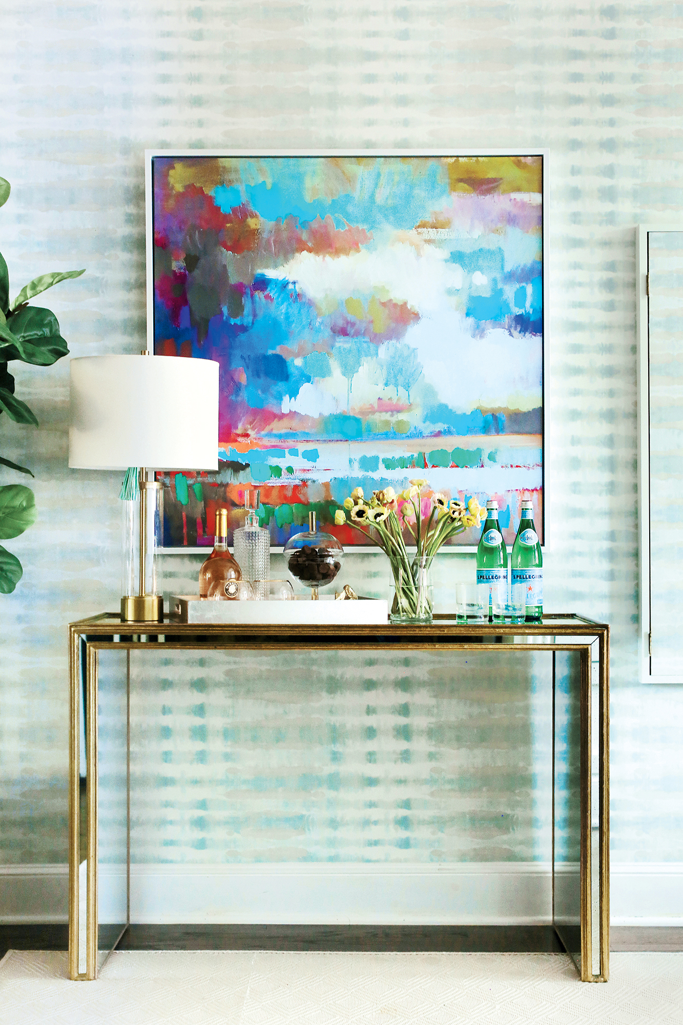 Prod2 - Washingtonian To enliven the setting, Major added fun wallpaper, an oversize artwork, and a console for cocktail-mixing.