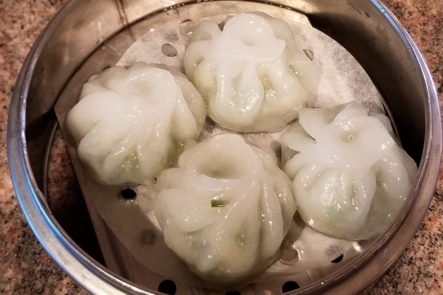 Steamed Shrimp and Bloom of Chives Dumpling at Gourmet Inspirations. Photograph courtesy of Andrew Quach.