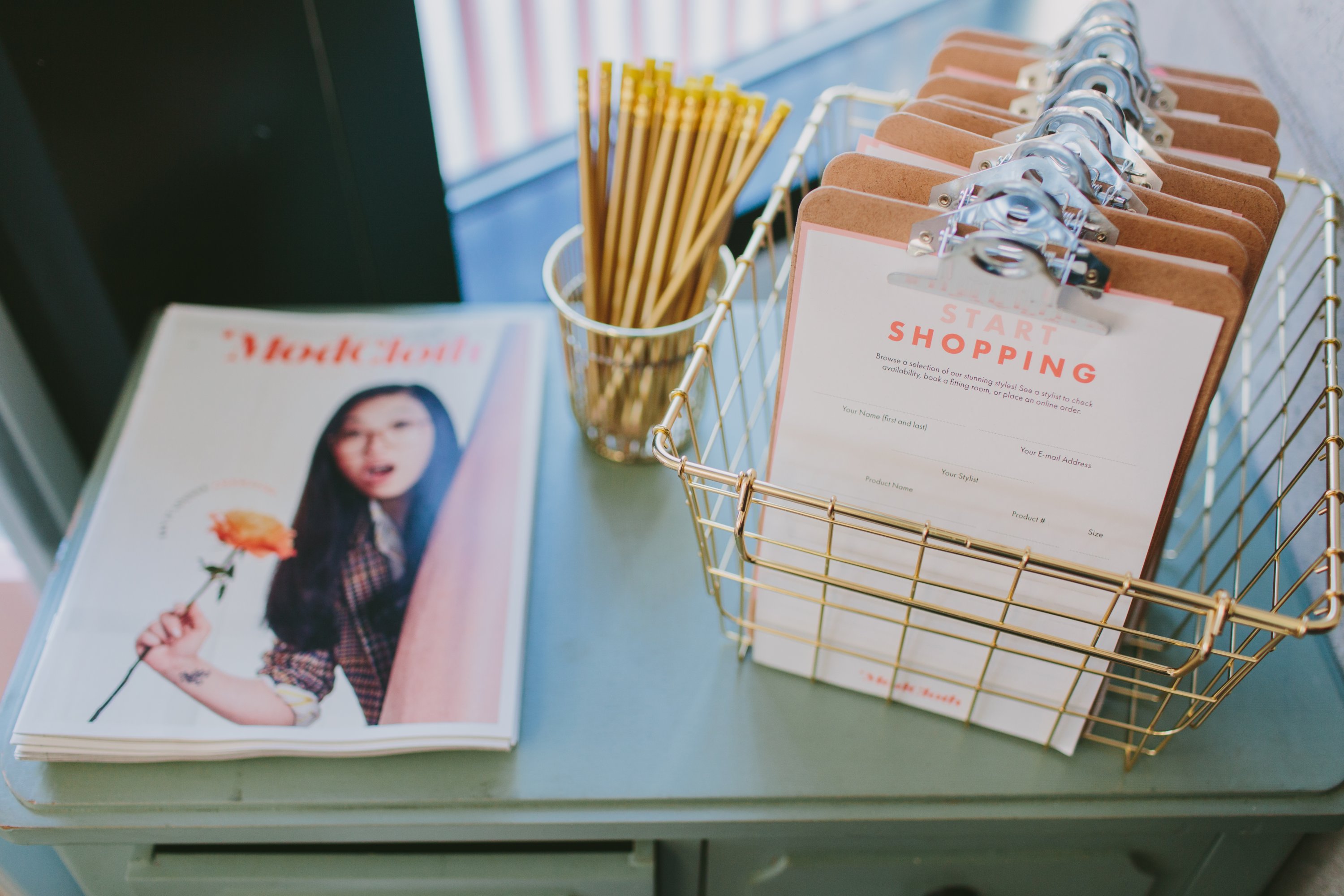 Shoppers will compile lists of clothes to try on and order using these clipboards. Photograph by Tori Watson Photography, courtesy of ModCloth. 