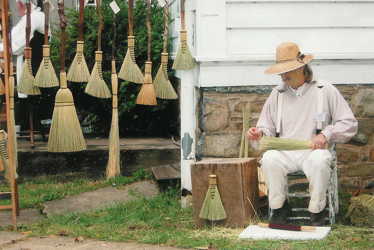 Make a straw broom at the Waterford fair.