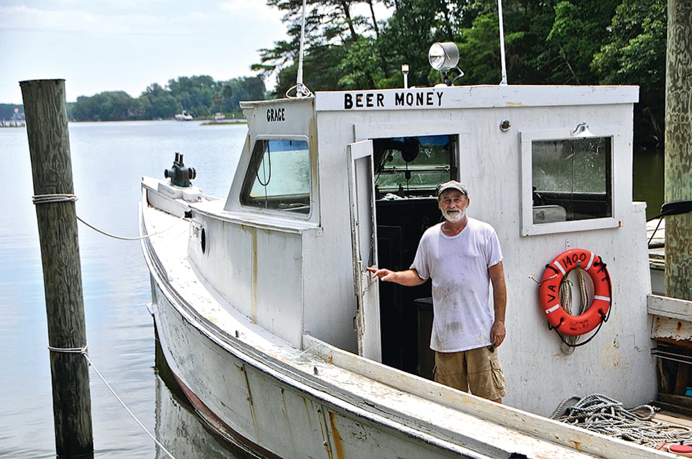 FWO4 - Washingtonian Northern Neck, Virginia Oysters. Coates aboard his curiously named workboat.
