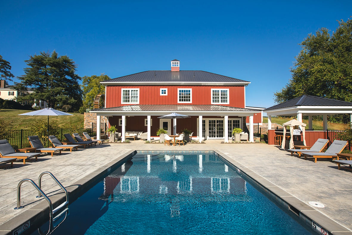 The Inn at Willow Grove’s new spa, which resembles a red barn, has a heated saltwater pool. Photograph of pool by Aaron Watson Photography.