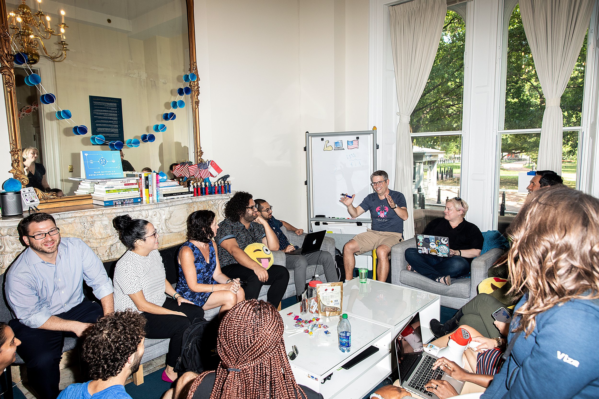 Cutts leads a meeting at agency headquarters, a townhouse on Lafayette Square. 