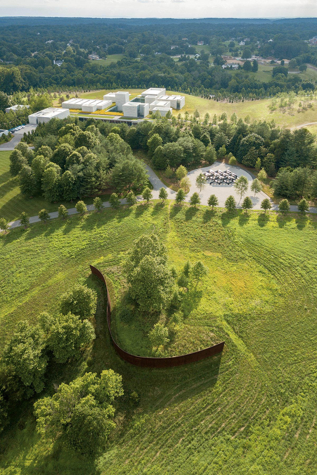 Surrounded by a lush landscape, Glenstone’s new building is mostly underground. Photograph by Iwan Baan.