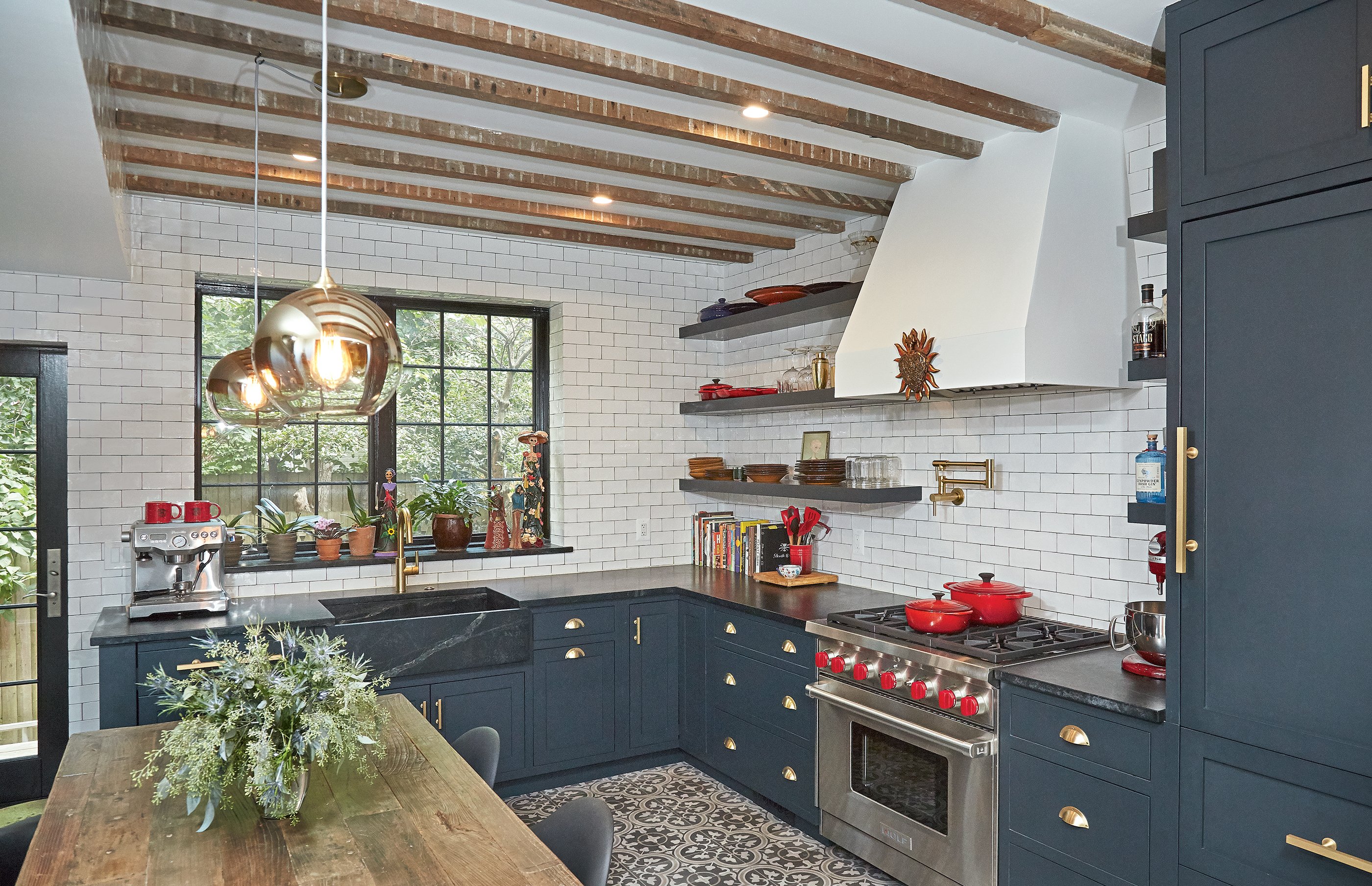 The owner had the cabinetry painted with Farrow & Ball’s “Railing.” Photograph by Jeff Elkins.