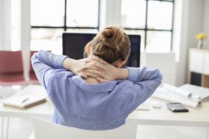 We Spend Half Our Lives Sitting. These Simple Exercises Will Get You Up—And Help Combat Neck and Back Pain