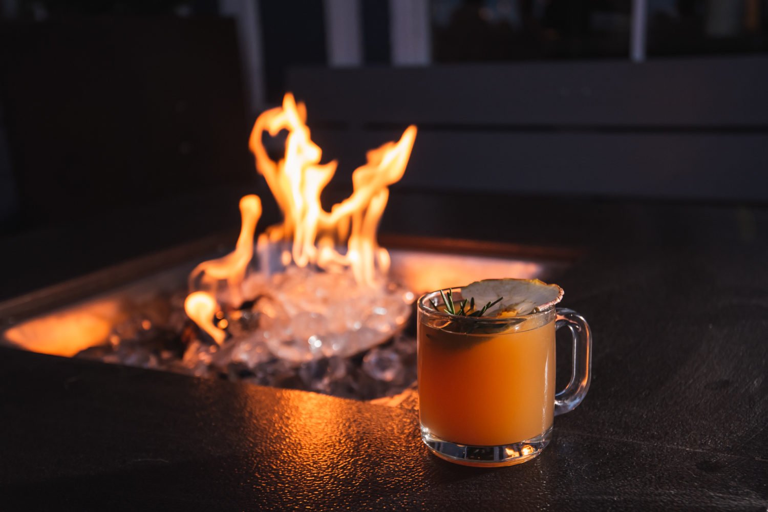 Warm up with a drink by the fire at the Salt Line. Photograph by Paul Kim.