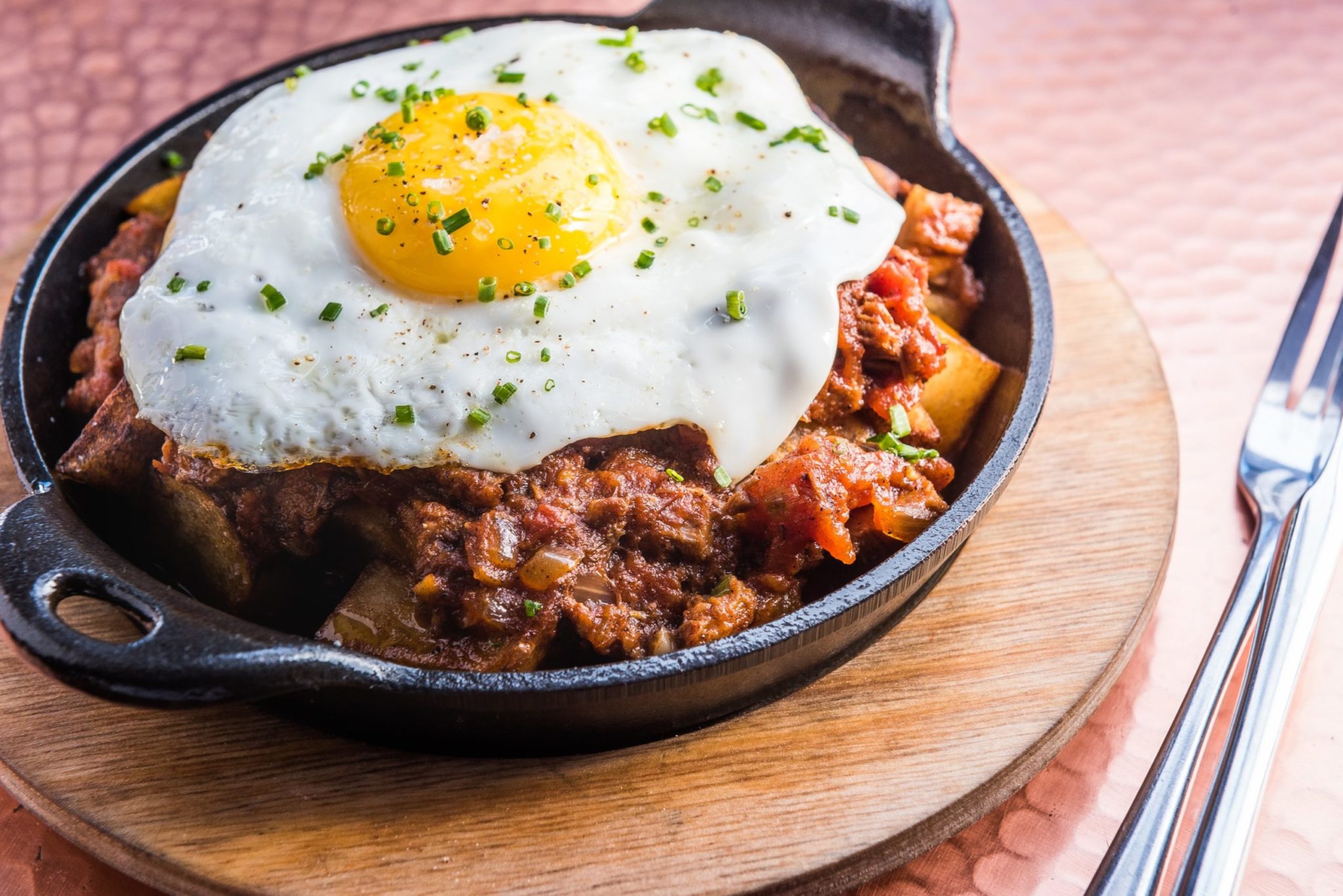 Brisket Chili Hash at America Eats Tavern. Photograph by Rey Lopez.