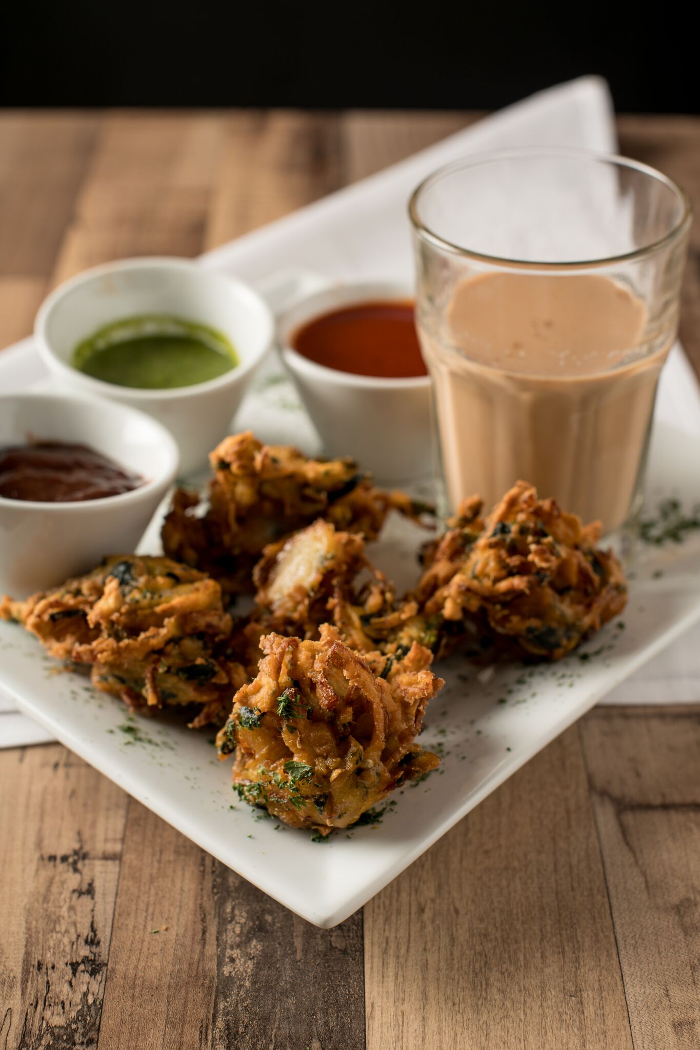 Pakora with chai from the monsoon section of the menu. Photograph by Emma McAlary. 