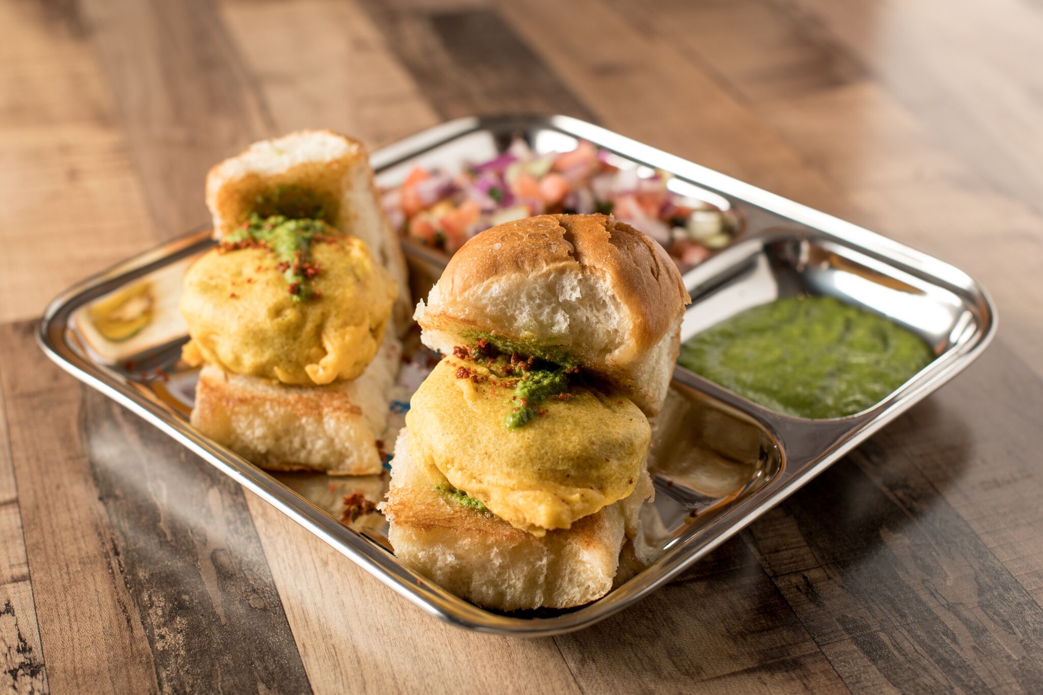 Vada Pav ( potato burger ) - Washingtonian Vada Pav, one of Asad Sheikh's favorite treats growing up. Photograph by Emma McAlary.