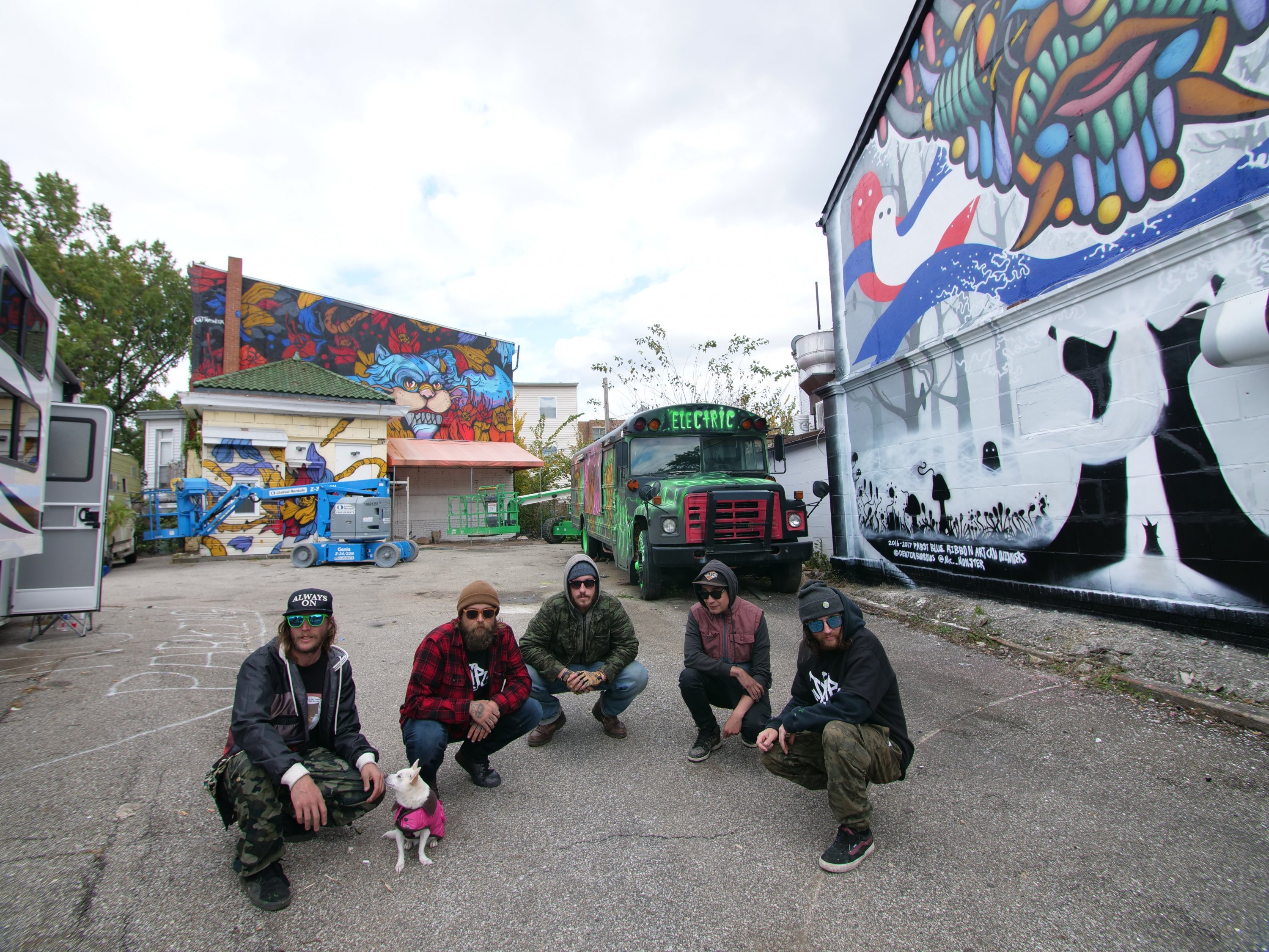 Dripped on The Road artists pose in front of their work. Photograph by Lisa Bolden. 