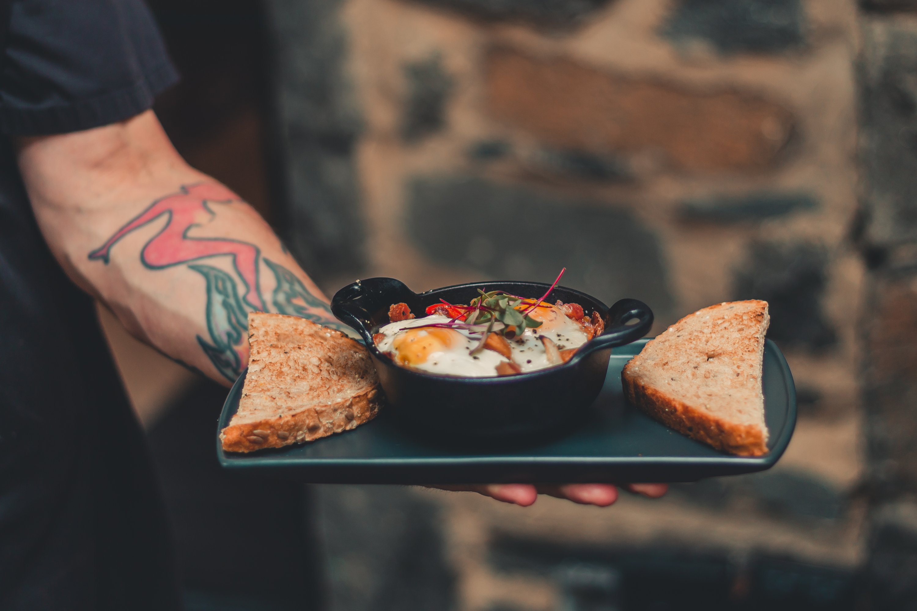 Baked farm eggs at Dyllan's Raw Bar. Photograph by Timothy M. Yantz. 