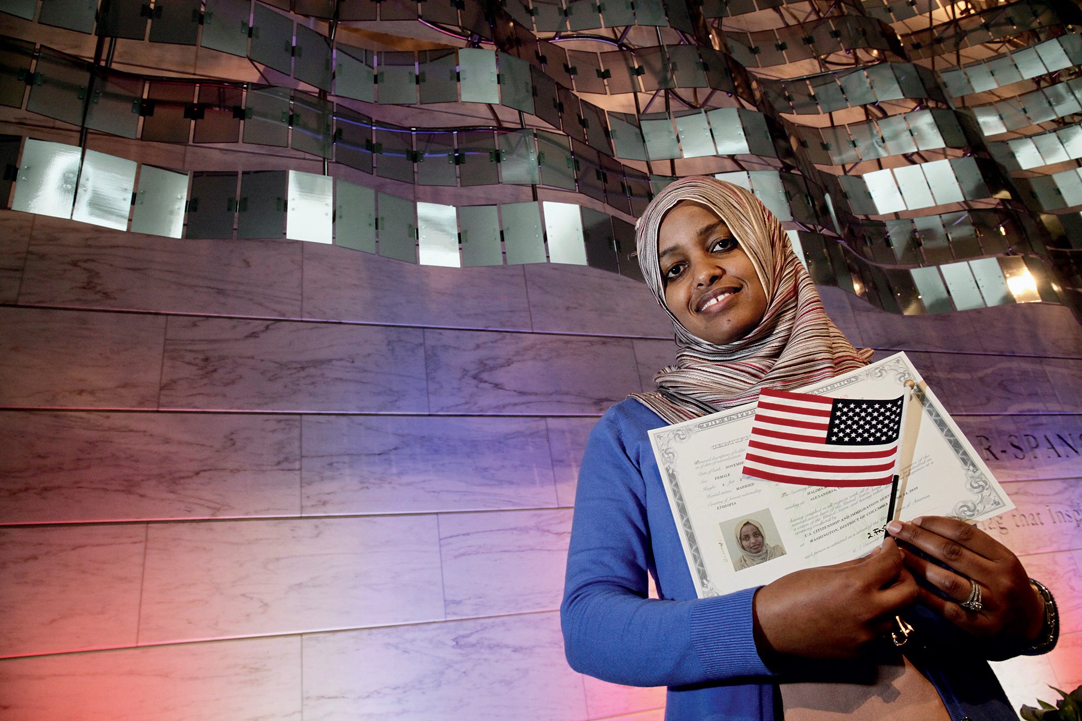 Photographs of Immigrants Becoming U.S. Citizens: National Museum of American History, June 14, 2018. The Flag Day ceremony took place in the building that houses the original Star-Spangled Banner that inspired Francis Scott Key.