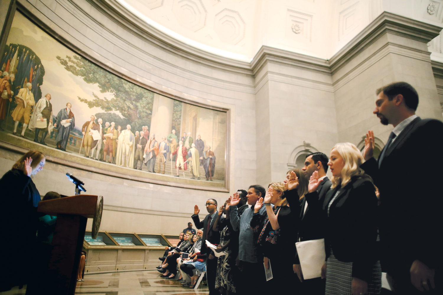 These Photographs of Immigrants Becoming U.S. Citizens in the Age of Trump Will Move You: National Archives Museum, September 15, 2017. The oath was given in the rotunda in front of the Constitution and the Declaration of Independence.