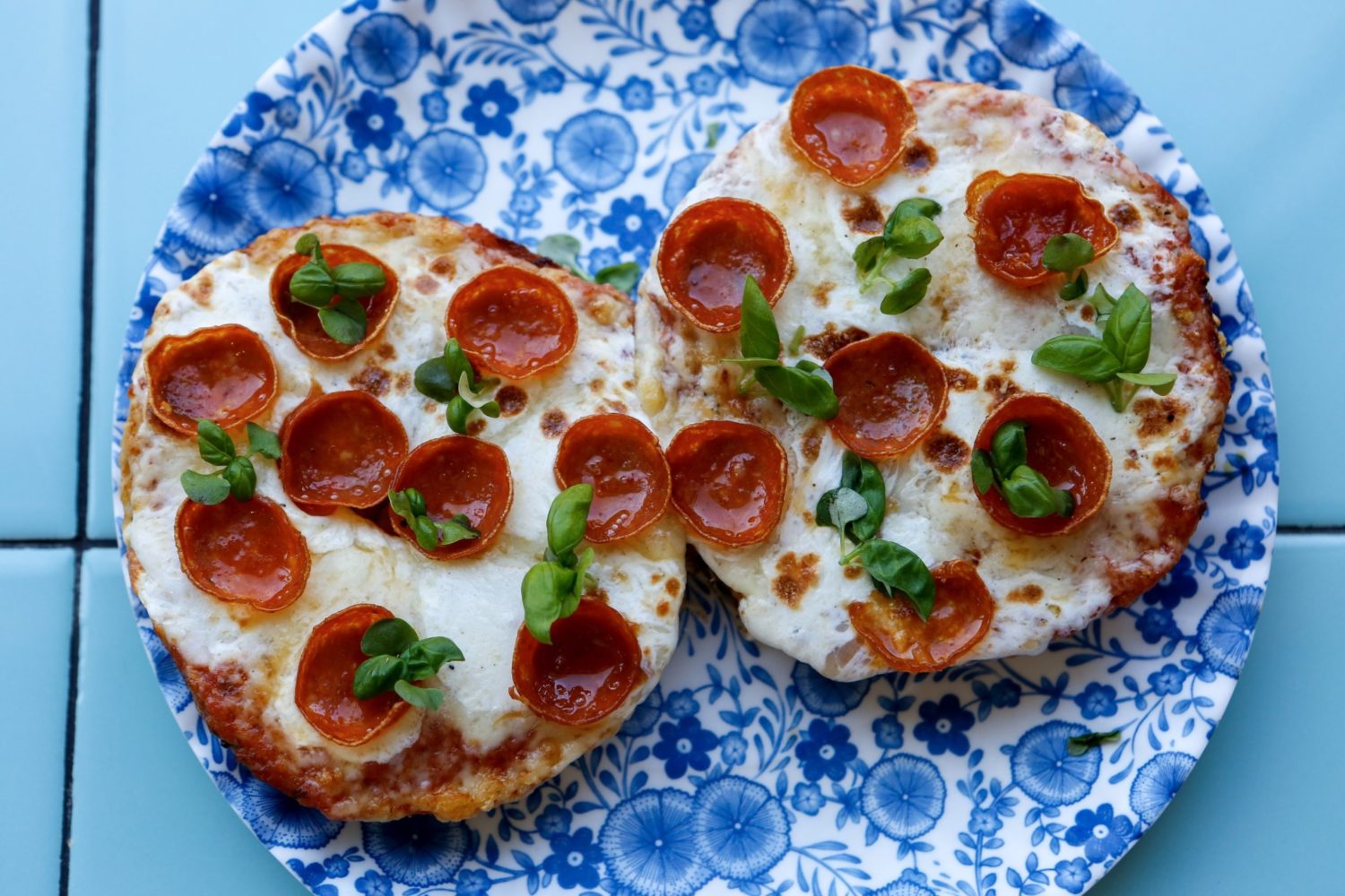 Call Your Mother's pizza bagel is topped with pepperoni and micro basil. Photograph courtesy of Call Your Mother.