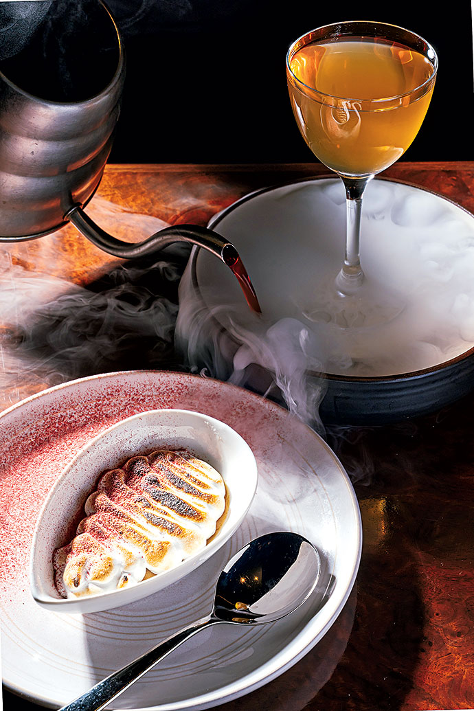 A raspberry-scented gin cocktail at Columbia Room—paired with caramelized white-chocolate marshmallow. A raspberry-scented gin cocktail at Columbia Room—paired with caramelized white-chocolate marshmallow.