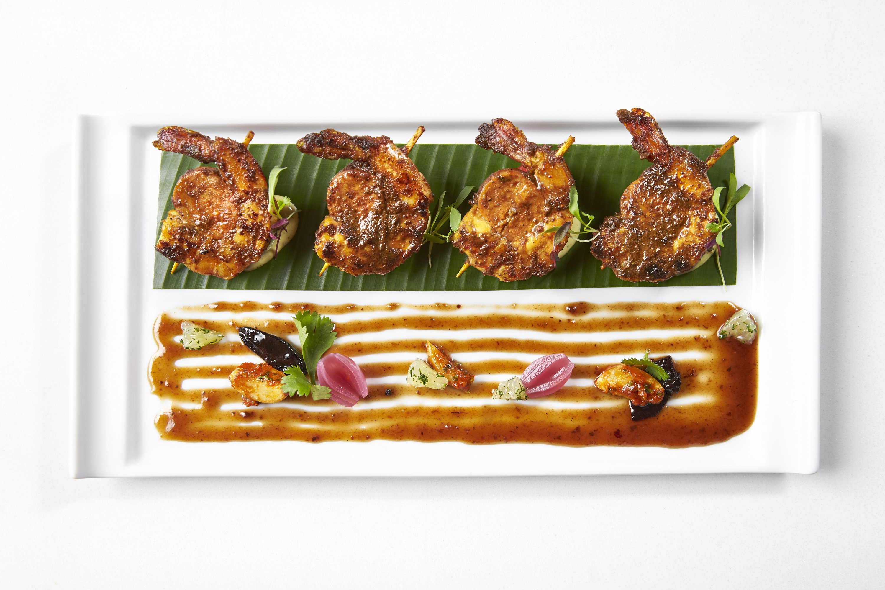 Calangute Beach Surf 'N' Turf - Washingtonian Skewers marry chicken chorizo and shrimp with flavors from Goa on the west coast. Photograph by Greg Powers.