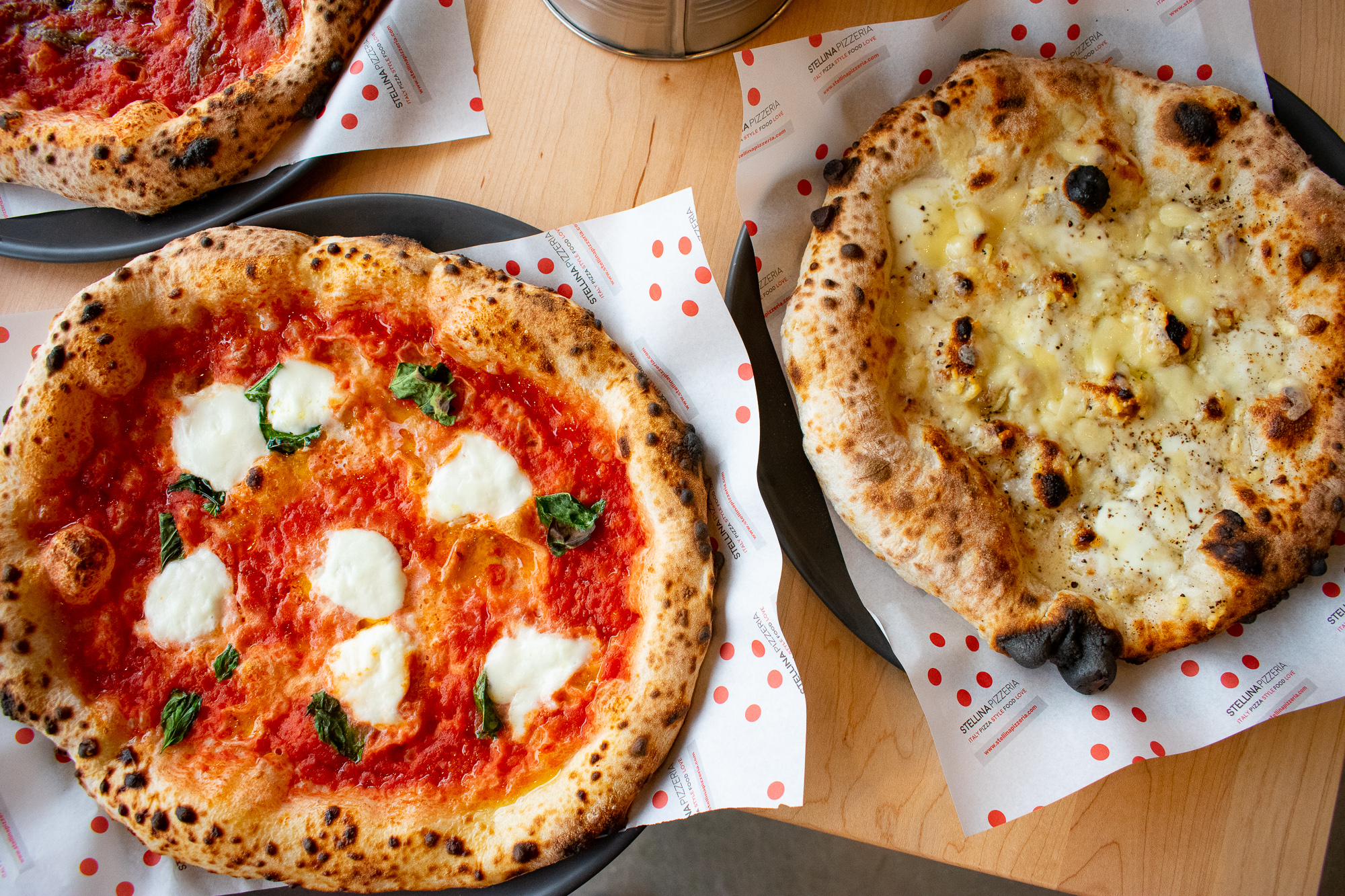 Margarita pizza and cacio e pepe pizza is made in the neo-Neapolitan style. Photograph by Meaghan Webster.