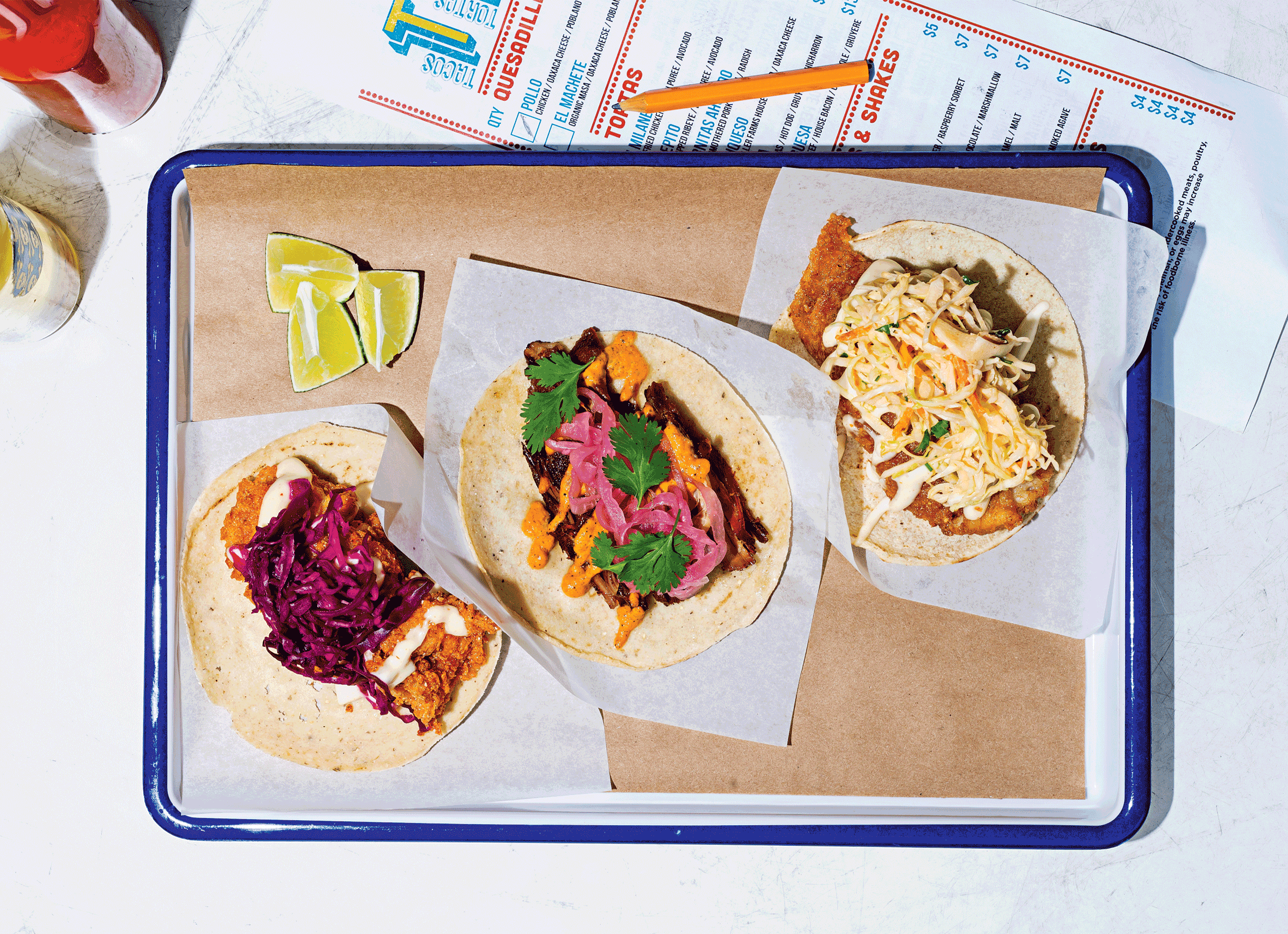 Crispy skate, Coca-Cola–marinated carnitas, and fried-shrimp tacos at Tacos, Tortas & Tequila.