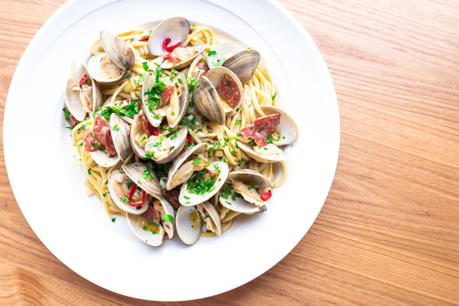 Pasta is handmade daily and topped with ingredients like clams or springy ramps. Photograph by Kelli Scott.