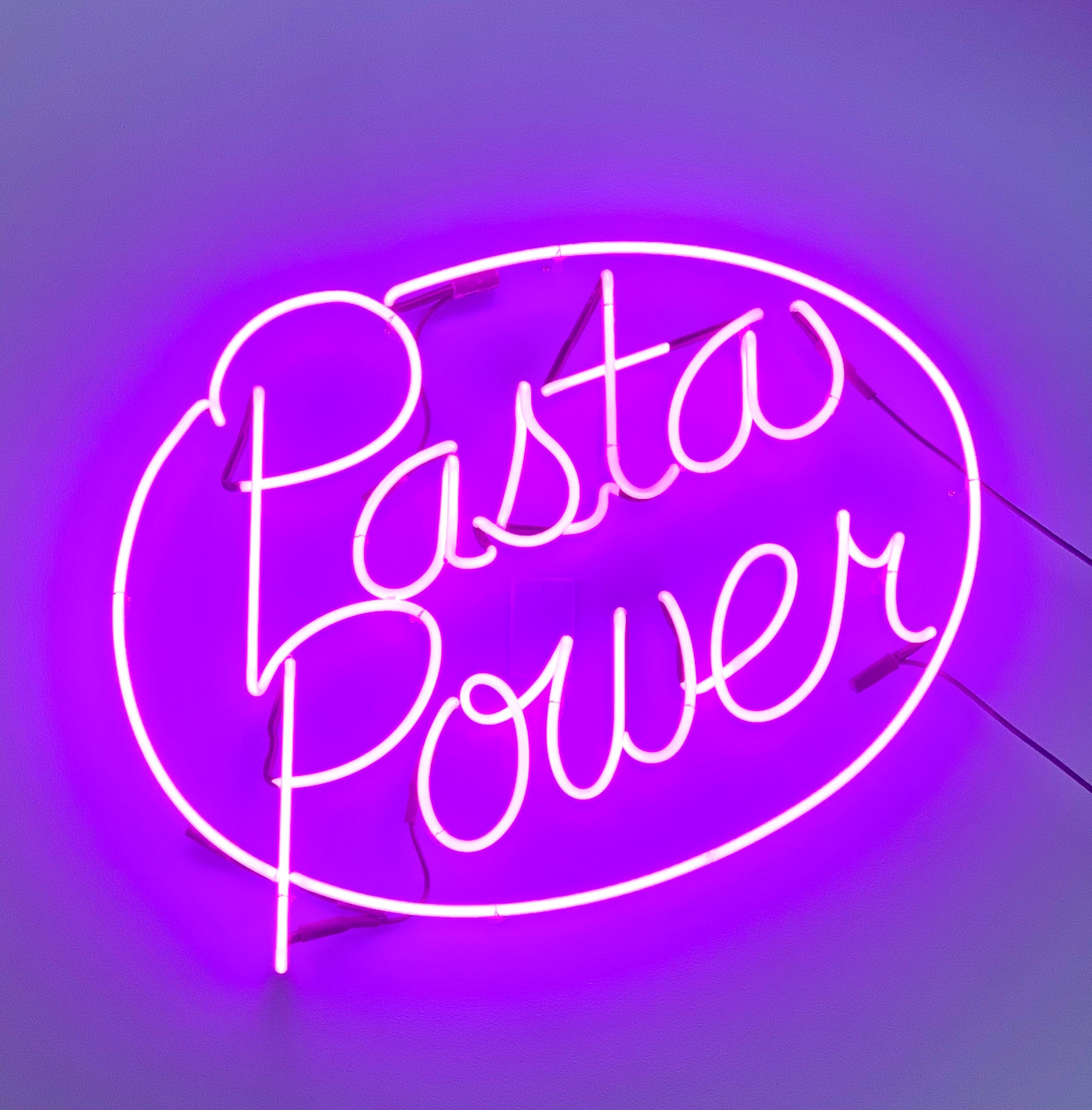 A neon "pasta power" sign gives a hints at the menu offerings. Photograph courtesy of Thompson Italian. 