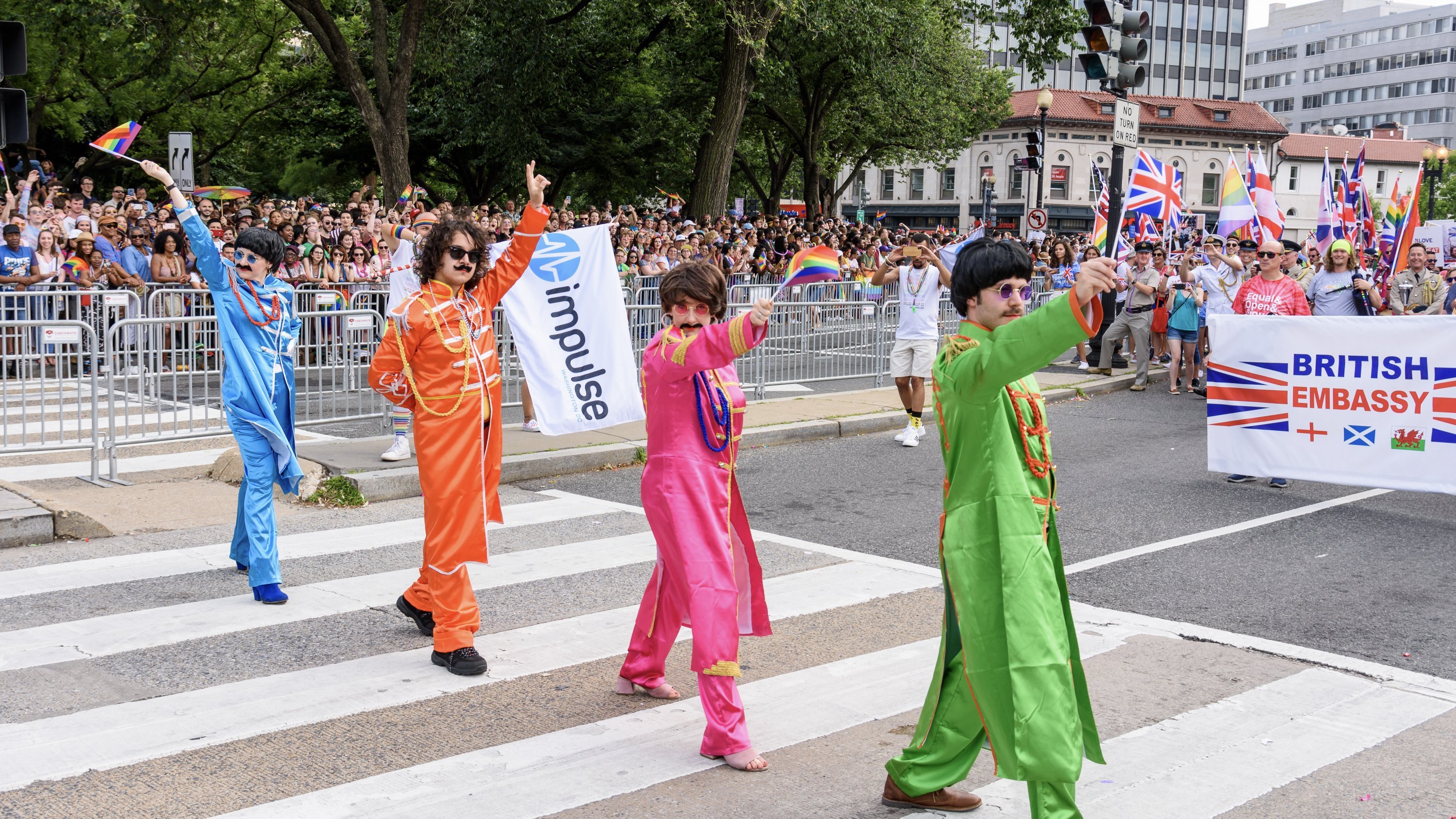 Pride Parade 2019-12 - Washingtonian Volunteers dressed as the Beatles pay homage to Abbey Road during the Capital Pride Parade. Photograph by Scott Marder.