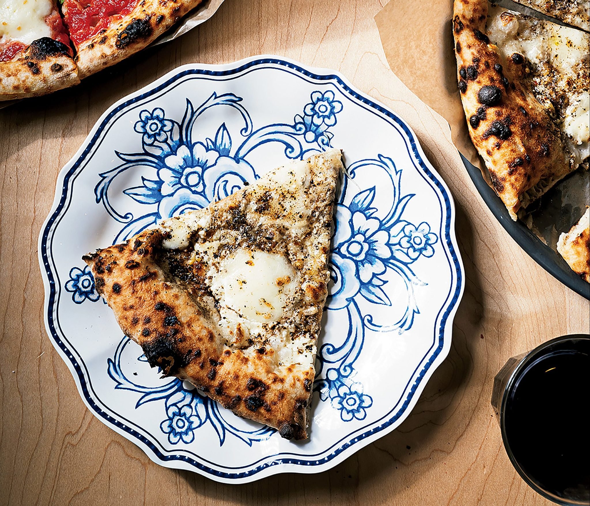 Stelinas cacio e pepe slice.