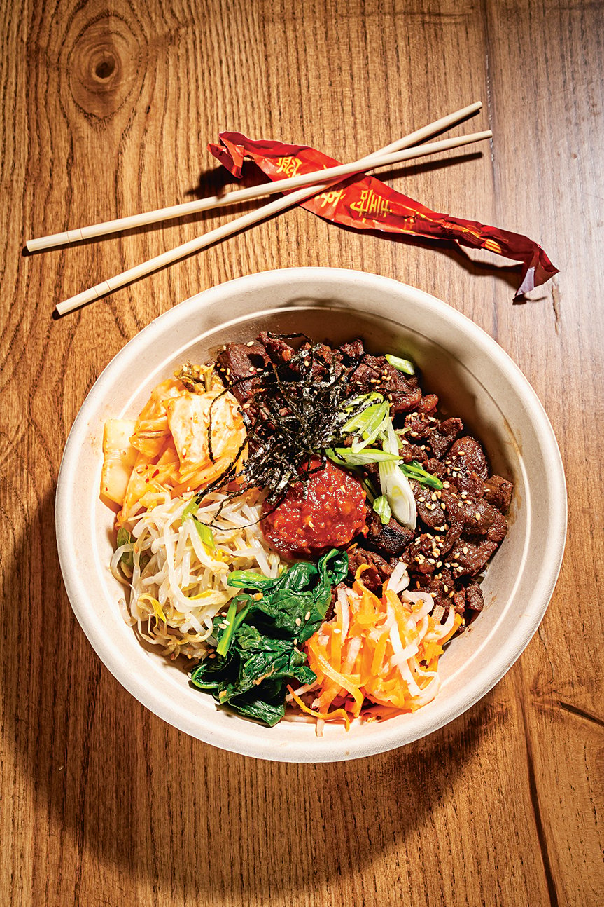 Rice Crook’s Korean barbecue-beef bowl topped with kimchee, bean sprouts, and pickled daikon and carrot.