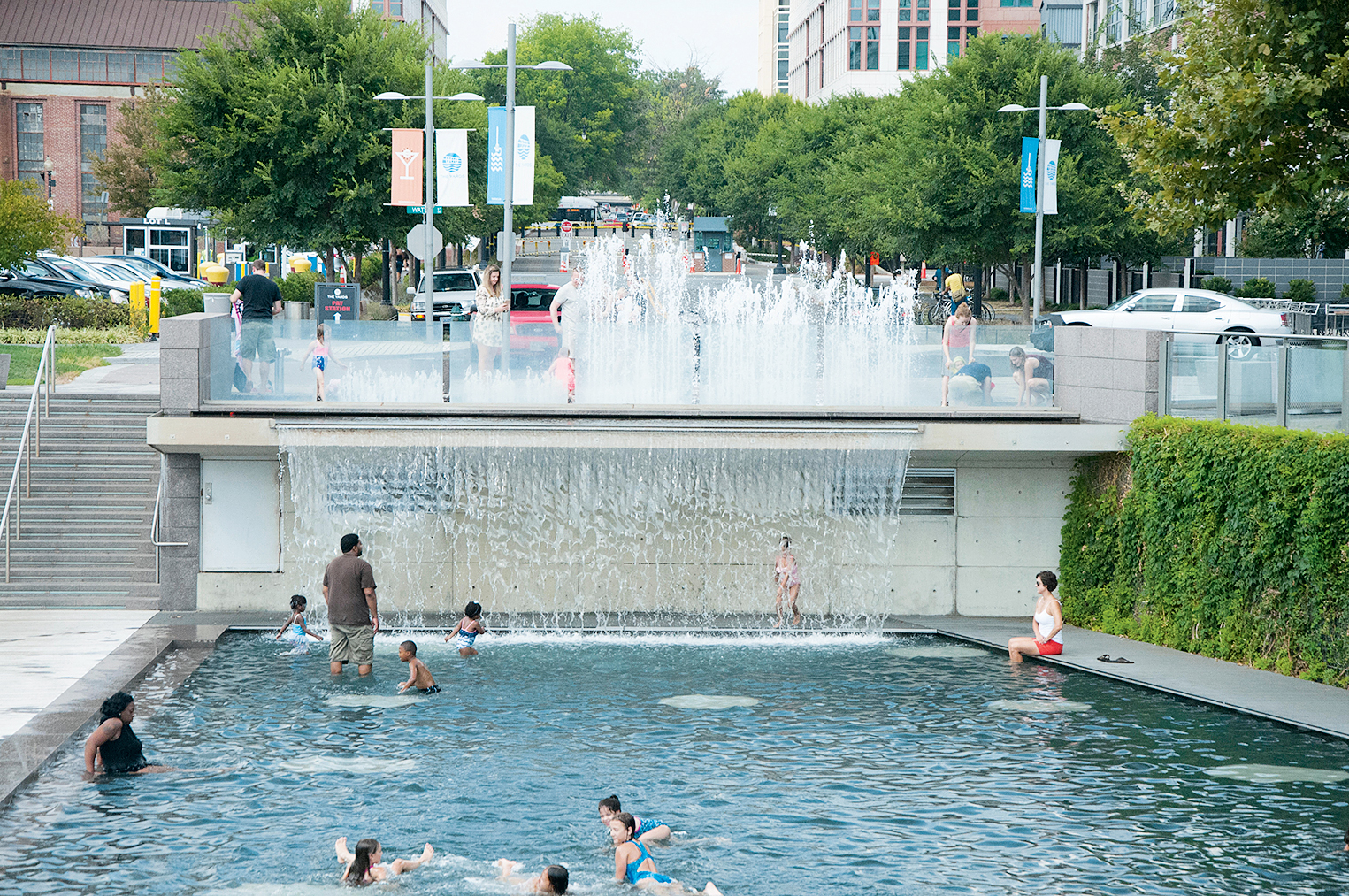 People are splashing in pool at Yards Park in the summer in Washington, DC. Image shot 2016. Exact date unknown. - Washingtonian Photograph of Yards Park by Phyllis Peterson/Alamy.