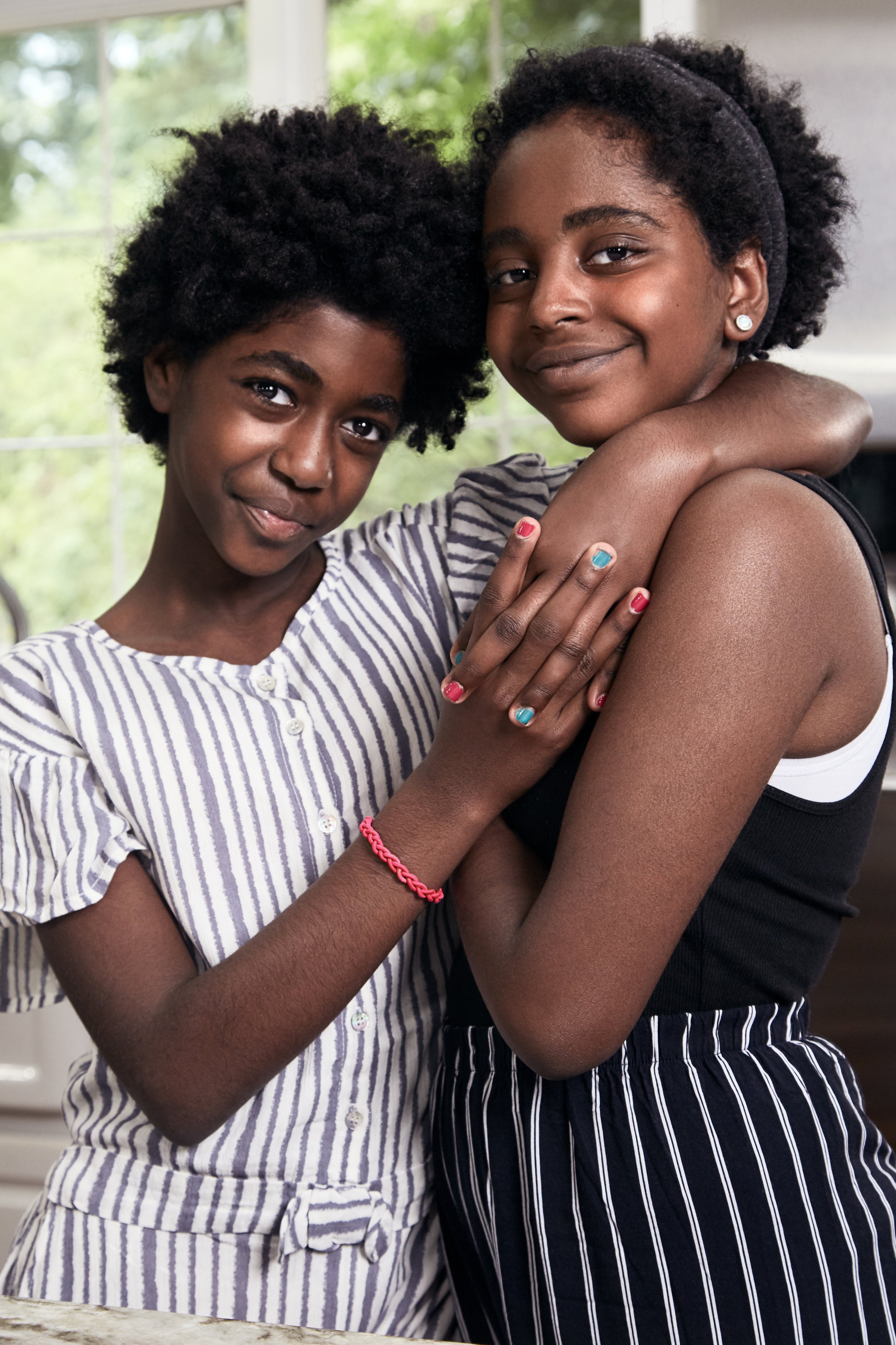 Naomi and her sister, Sarah, were adopted from Ethiopia by their mother, Julie Wadler, a former Republican operative.
