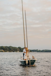 This Couple Got the Dreamiest Engagement Photos on a Sailboat. Here’s How They Did It.