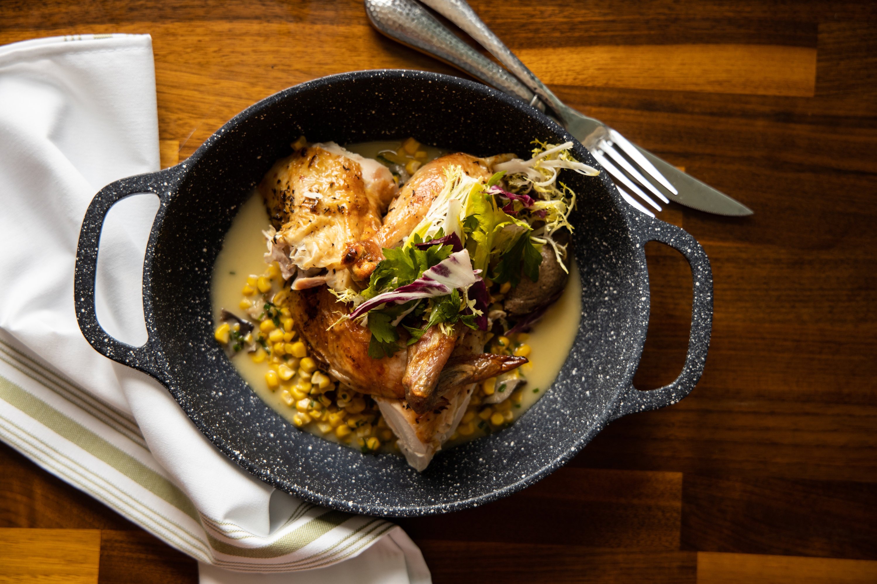 Rotisserie chicken paired with corn and smoked mushrooms. Photo by Jennifer Chase. 
