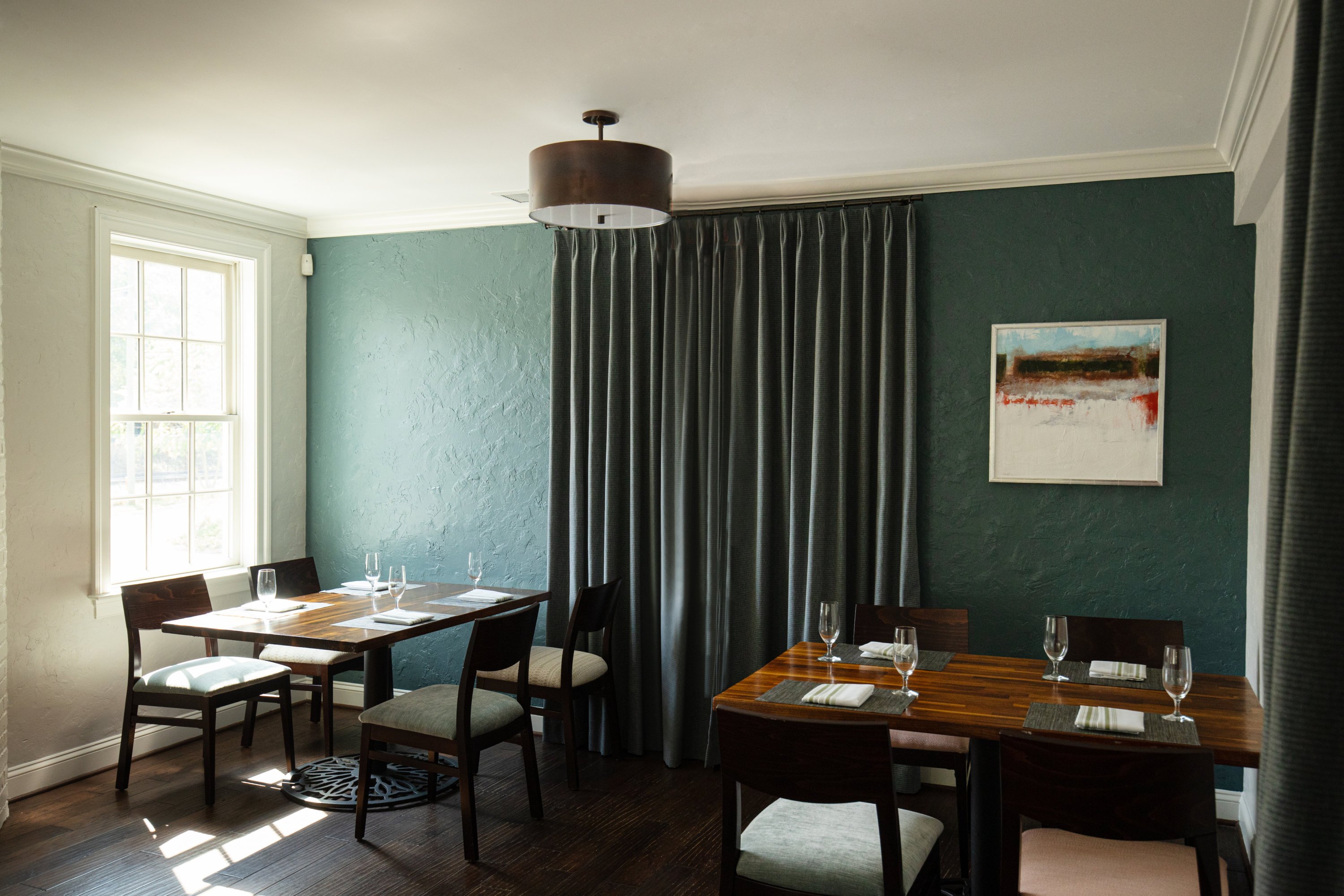 A dining room is repainted shades of teal. Photo by Jennifer Chase.