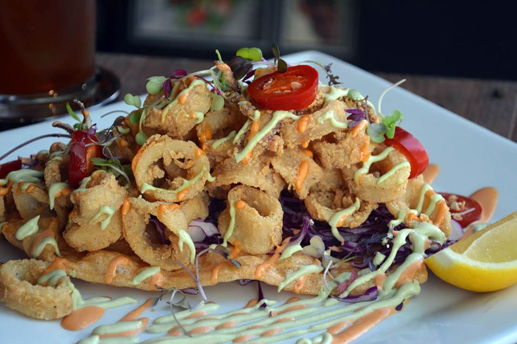 There's plenty of seafood on the menu at Anafre, like the chicharron preparado featuring fried calamari and valentina sauce. Photo courtesy of Anafre.