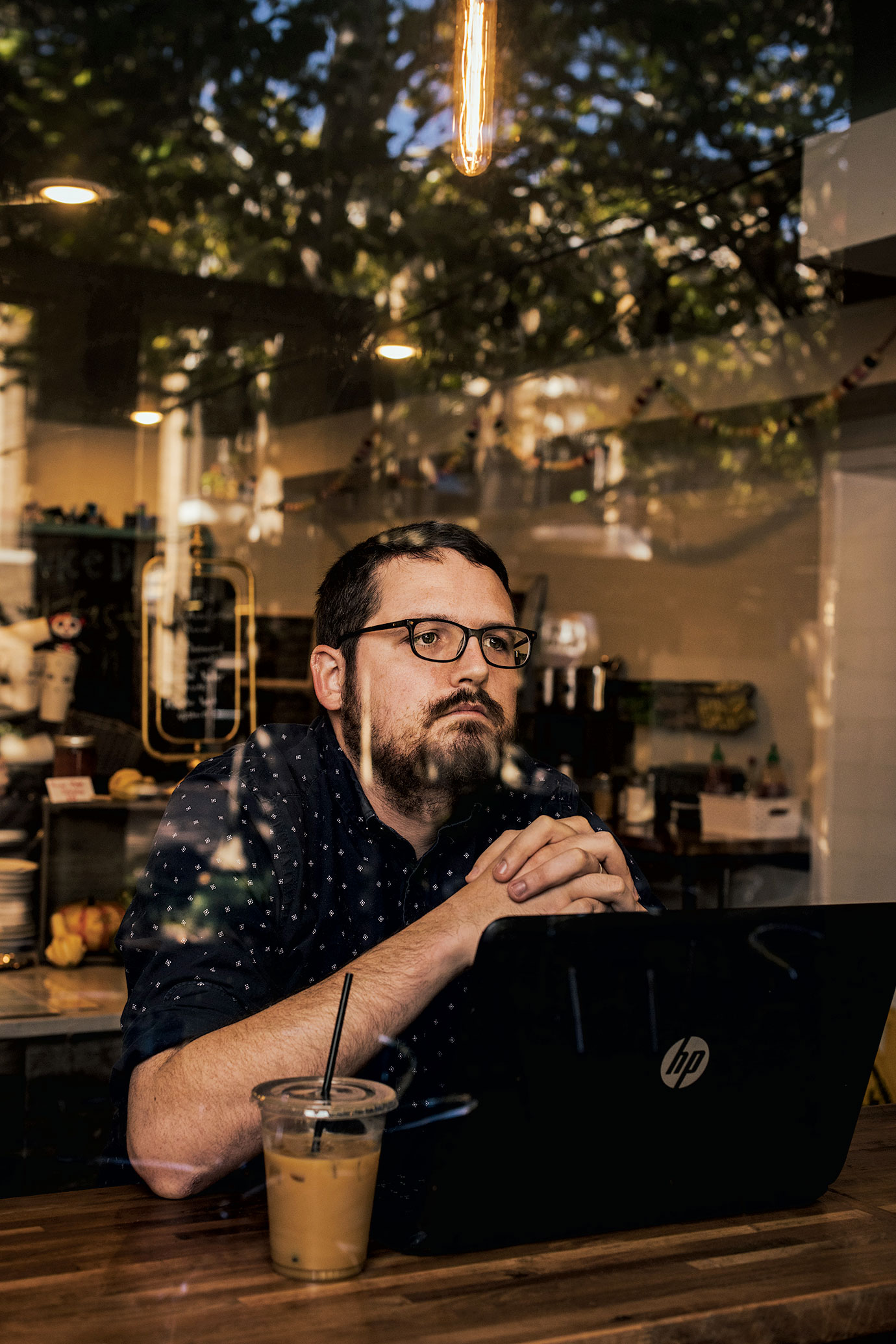 merchant-reston - Washingtonian Fairfax County wants to build up Reston so that young workers like programmer Canaan Merchant, who currently rents, will be able to buy. Right now, prices are out of reach for the father of three. Photograph by Stephen Voss.