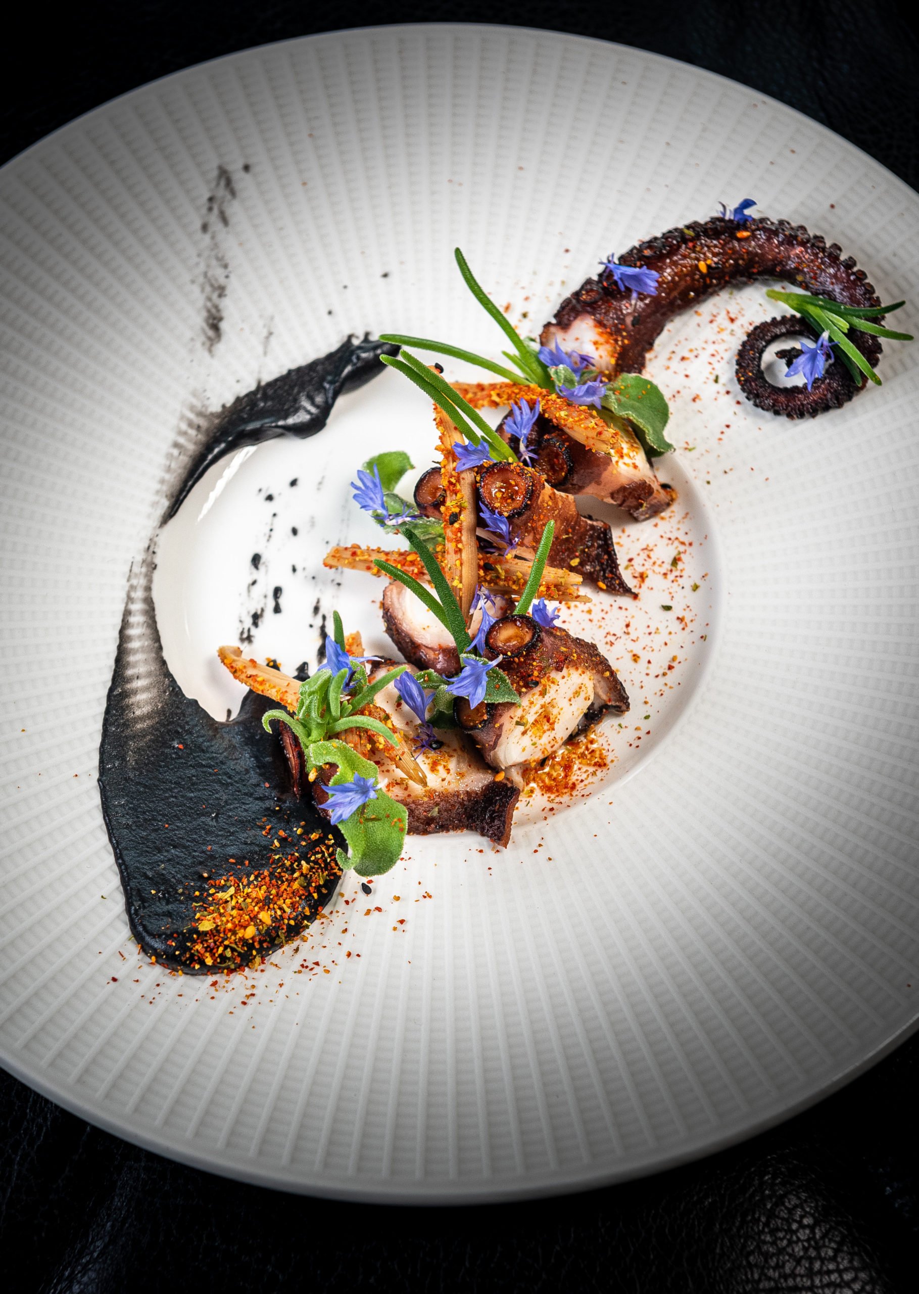 untitled-14221 - Washingtonian Octopus with smoked paprika oil and sake butter. Photo by Rey Lopez.