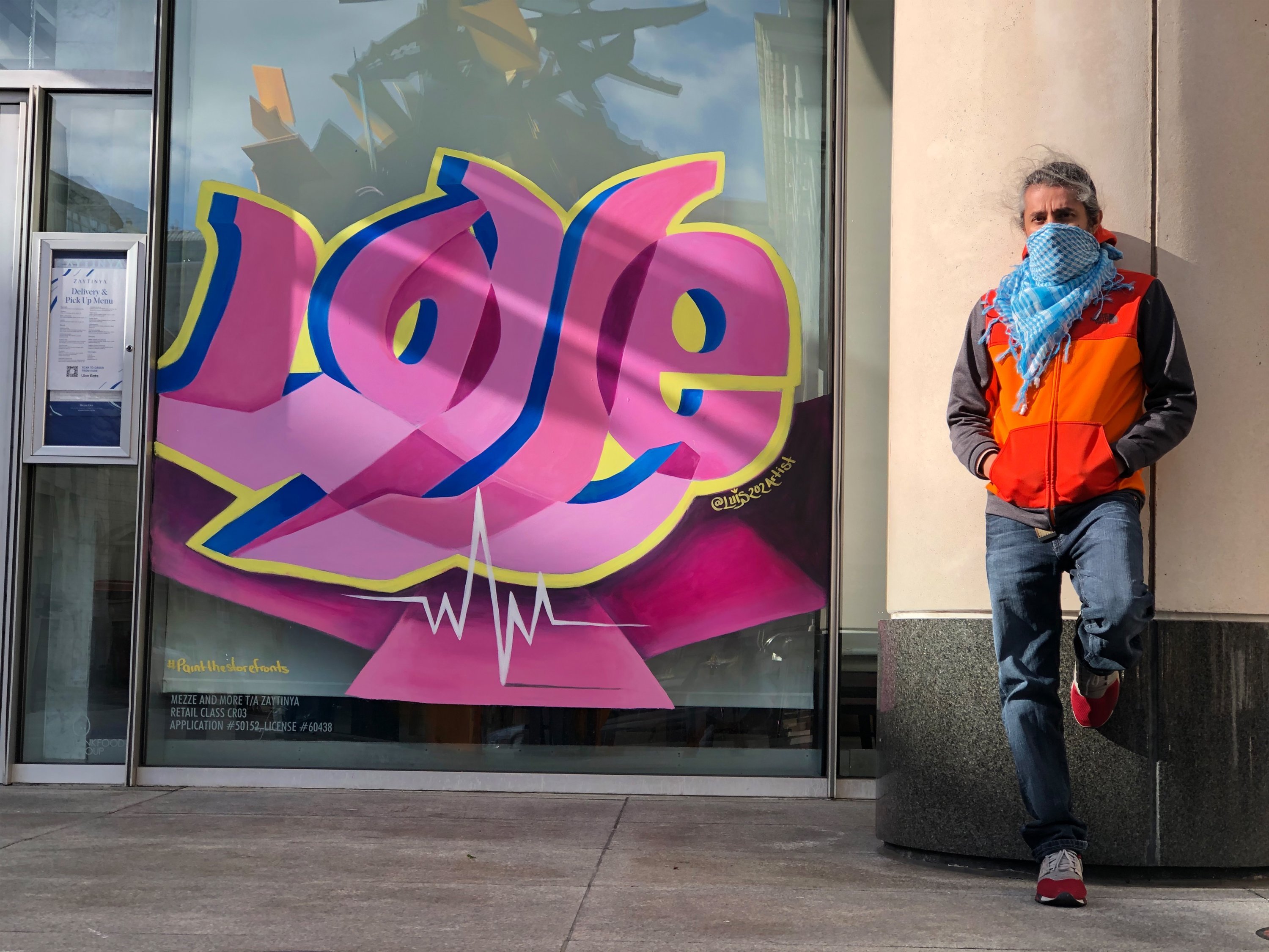 Photos: Boarded-up storefronts provide new canvas for graffiti in