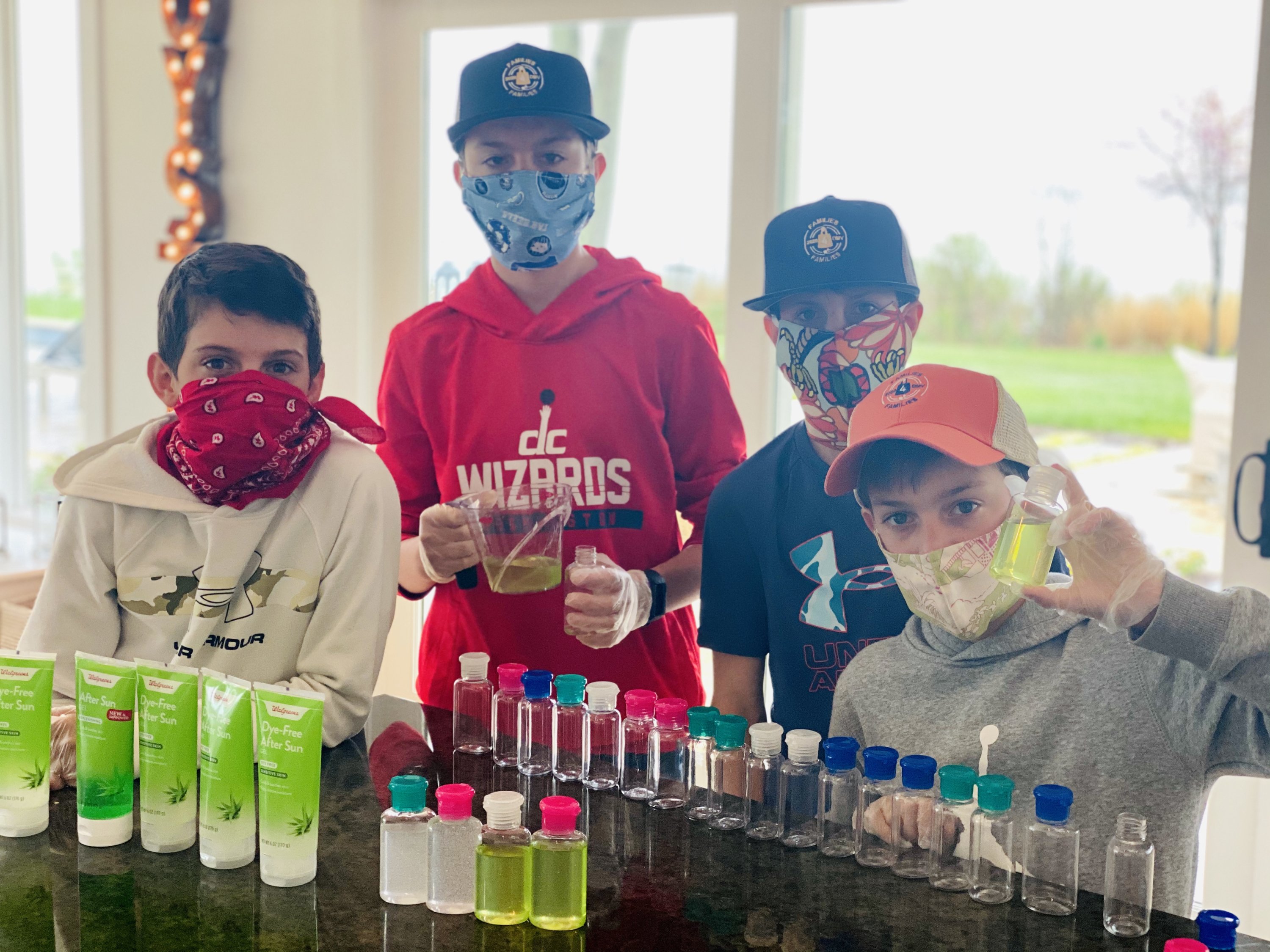 boys making homemade sanitizer - Washingtonian
