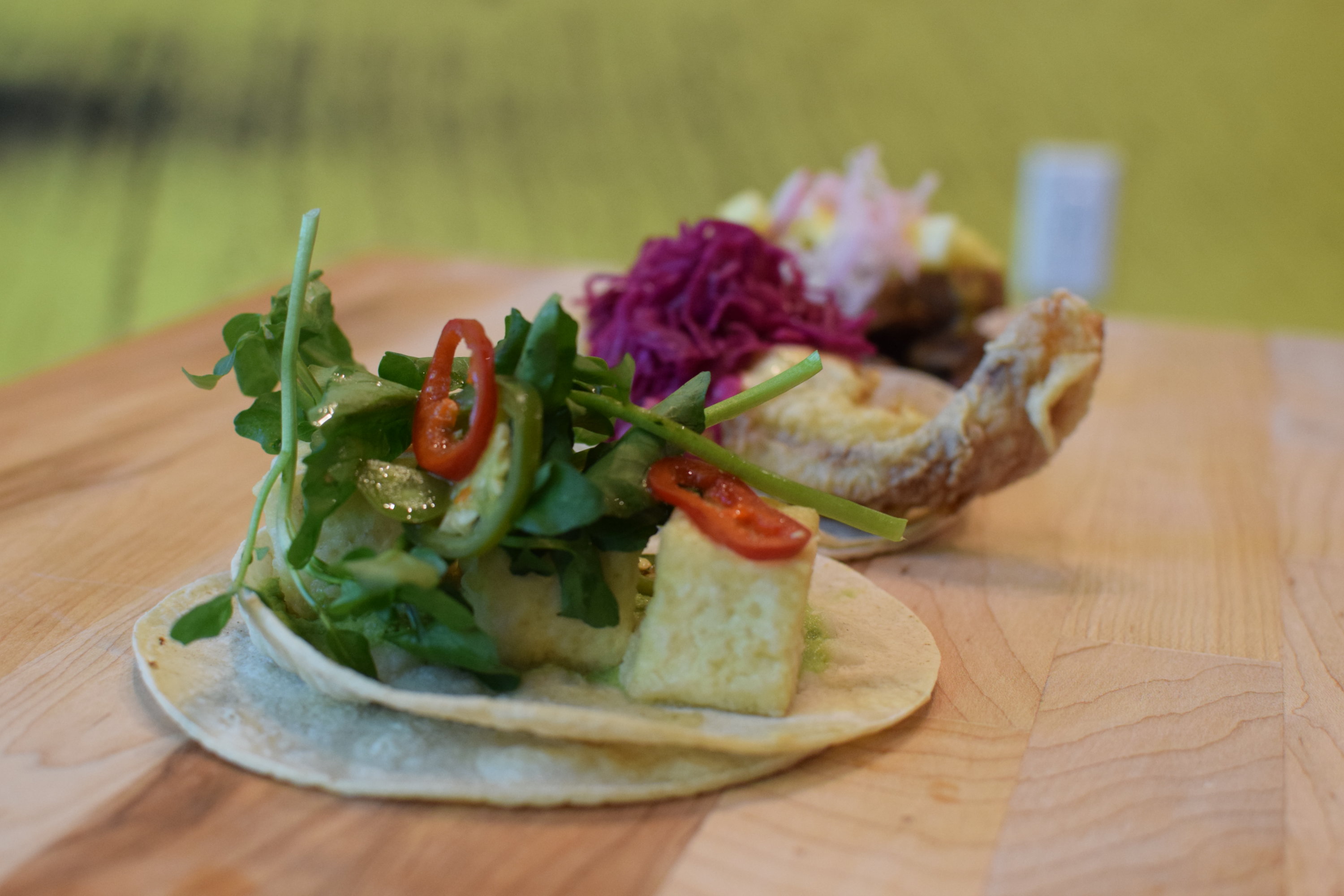 A masa tofu taco with watercress. Photo courtesy of Taco and Piña. 