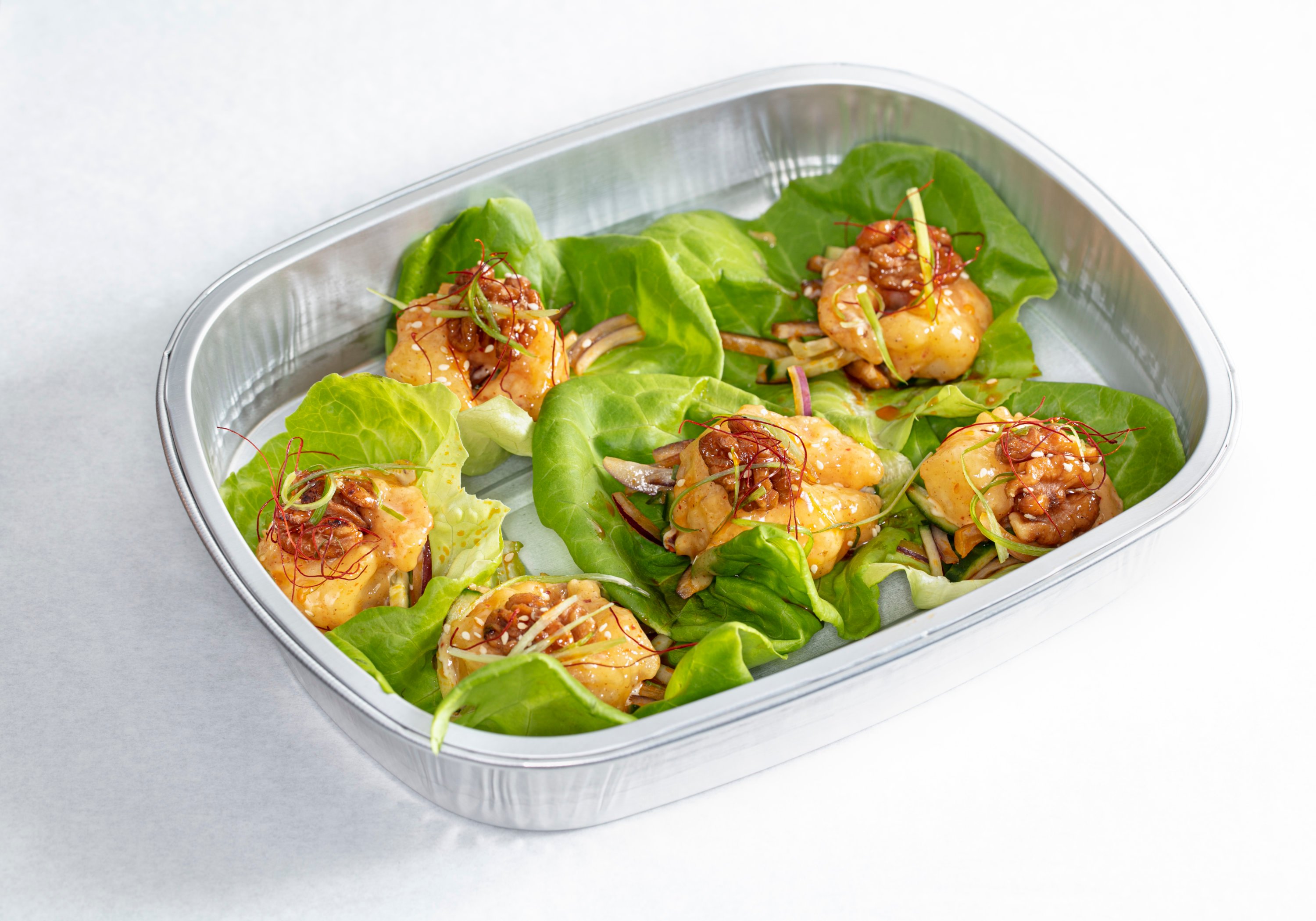 Grand Marnier prawns in lettuce cups. Photo by Melissa Hom. 