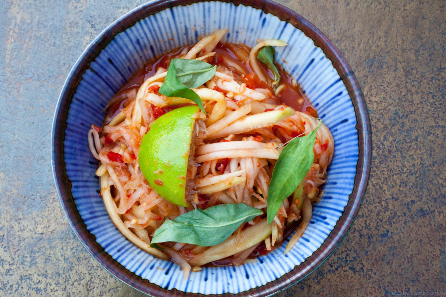 Kerabu Mangga, a green papaya and mango salad at Makan. Photo courtesy of Makan.