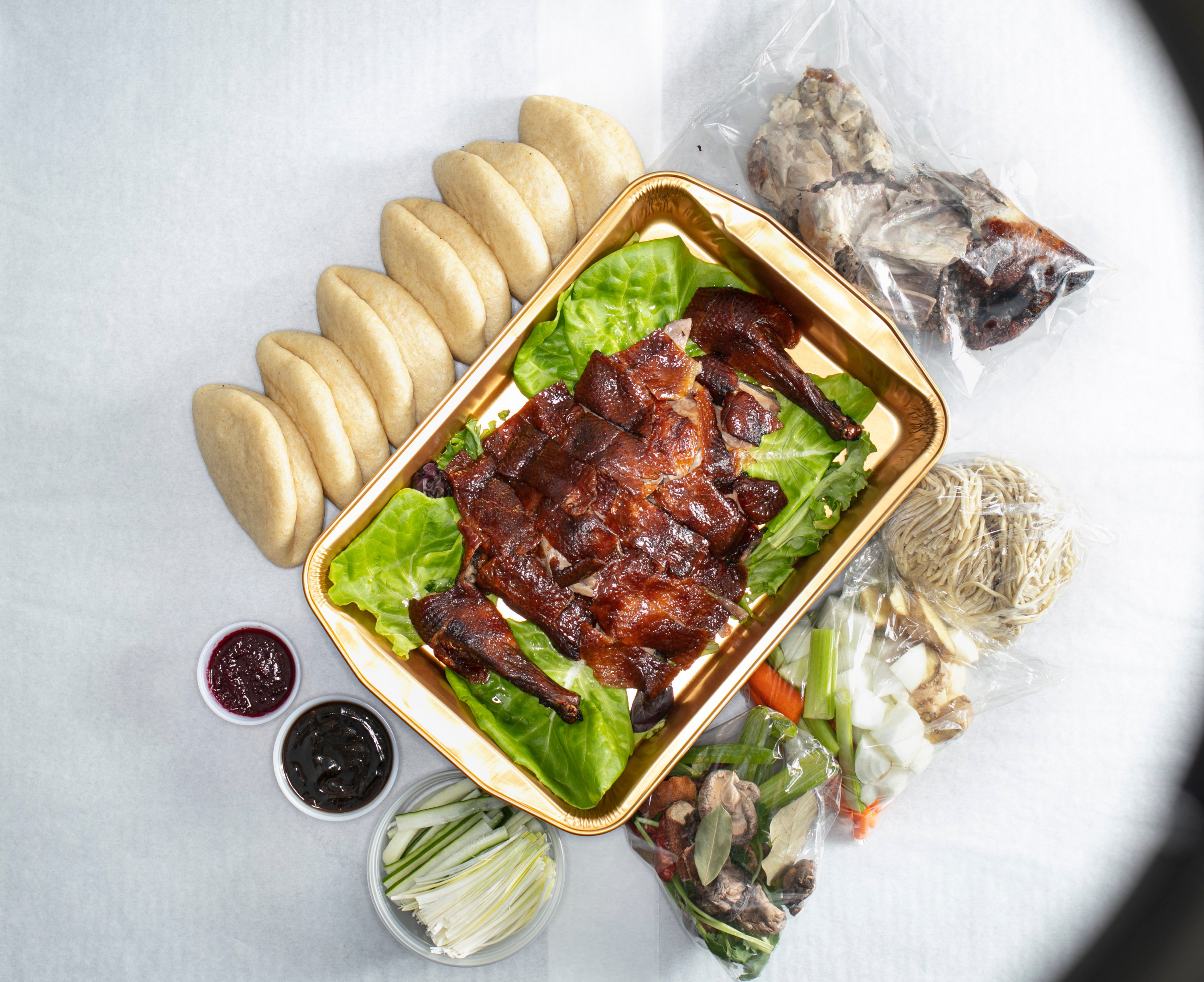 Peking duck kits arrive with buns and housemade noodles. Photo by Melissa Hom. 